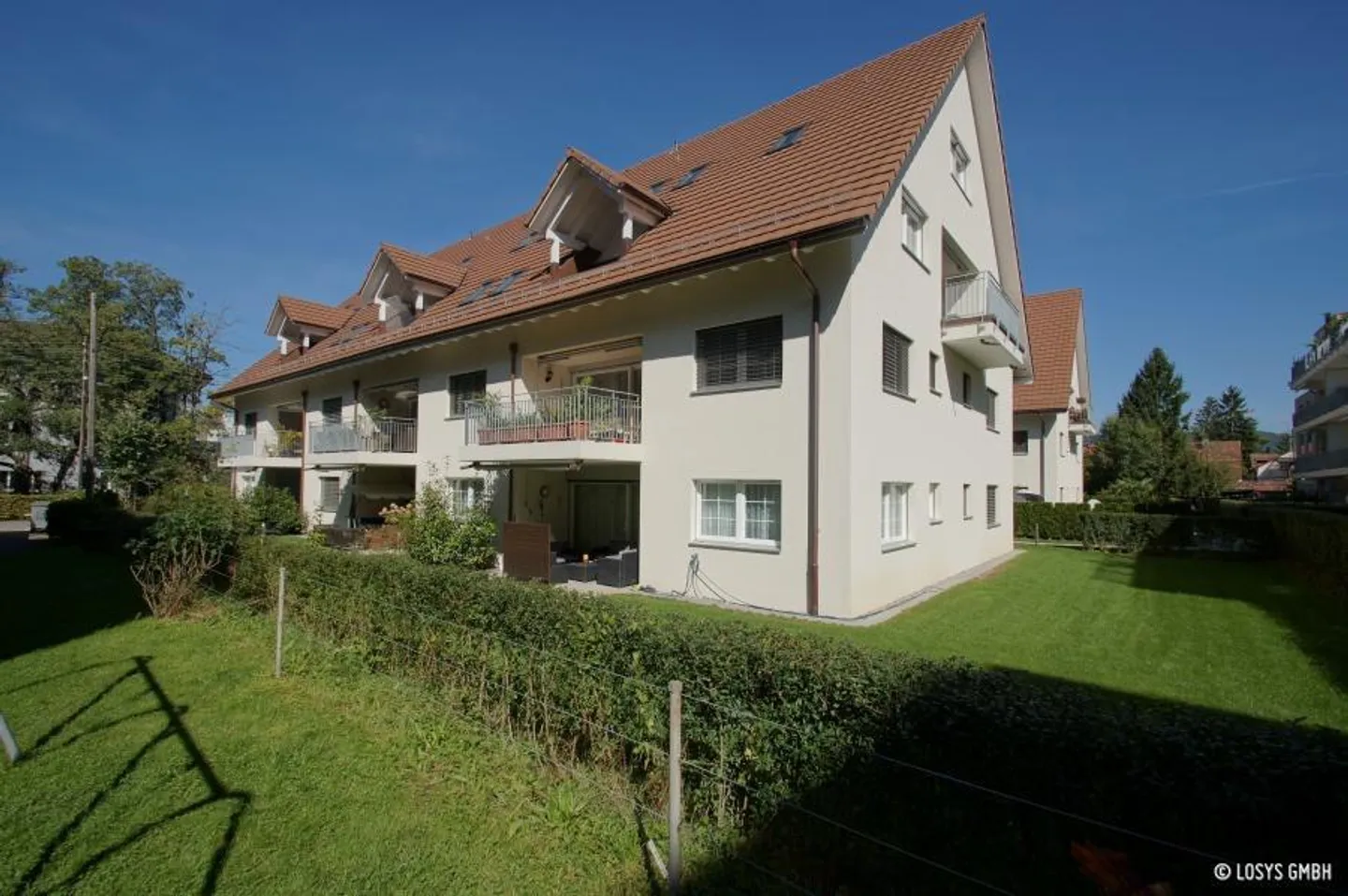 Place de parking à louer dans un emplacement central à Dietikon - Photo 1 sur 2