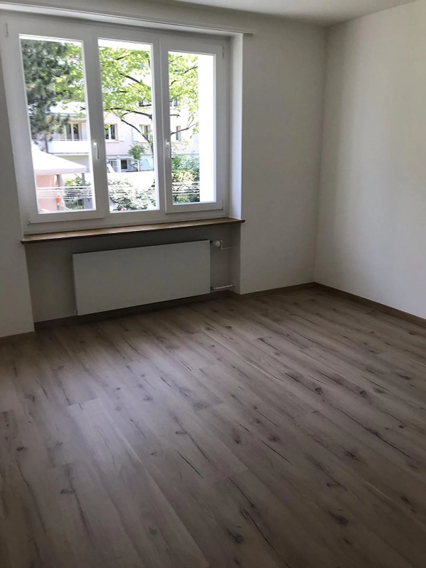 Belle appartement de 3 pièces au rez-de-chaussée à Birsfelden - Photo 12 sur 13