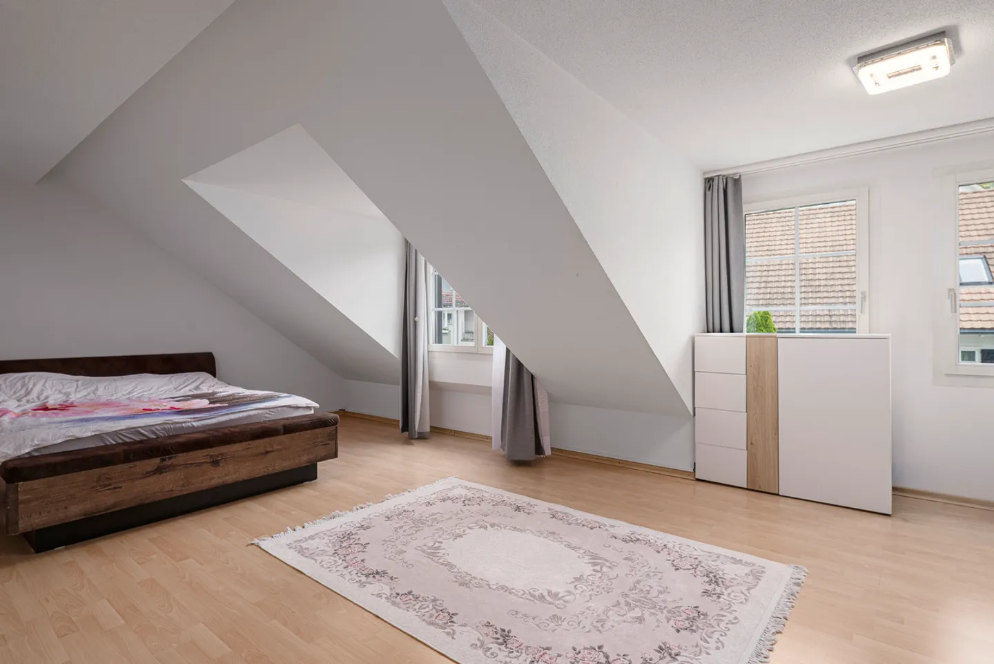 Appartement en duplex de 5.5 pièces familial sous les combles - Photo 9 sur 11
