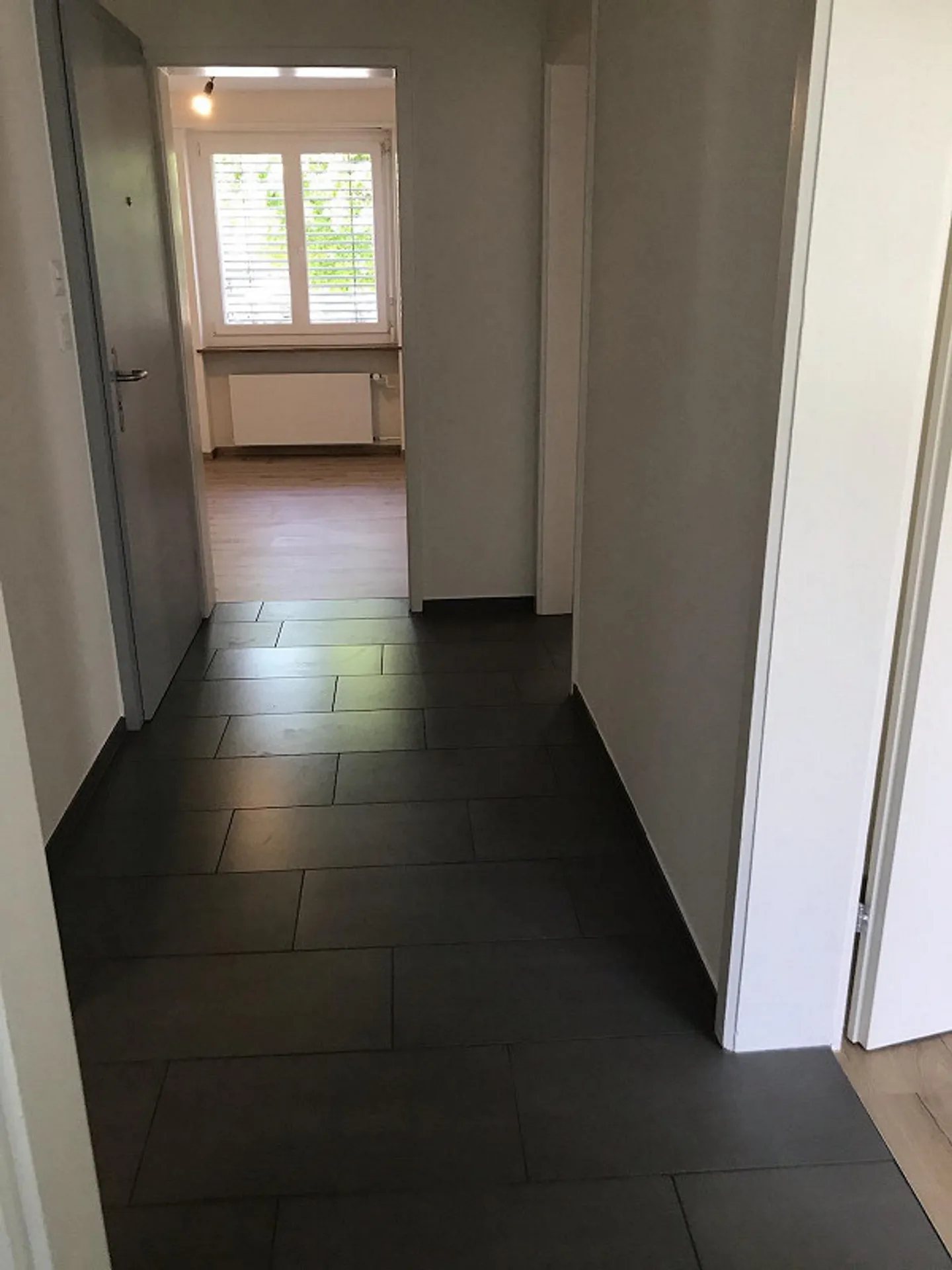 Belle appartement de 3 pièces au rez-de-chaussée à Birsfelden - Photo 2 sur 13