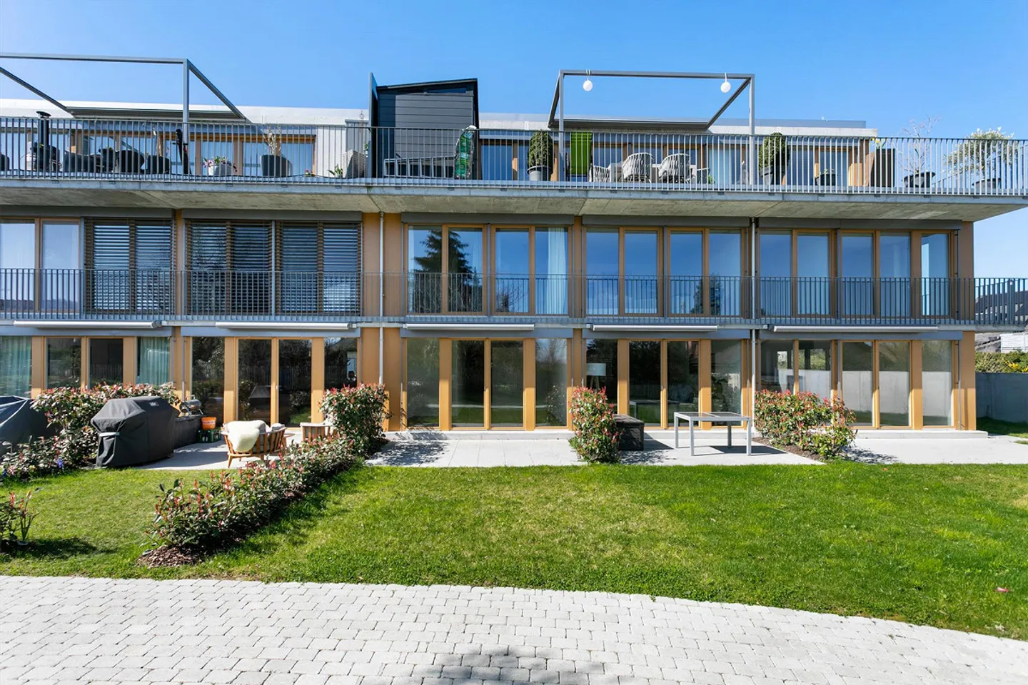 Appartamento di 4,5 stanze di nuova costruzione nel quartiere di Bernrain, piano terra con un po' di vista sul lago - Foto 1 di 30