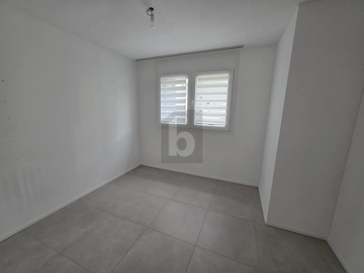 MODERN AND WELCOMING IN A SUNNY LOCATION - Photo 5 of 6