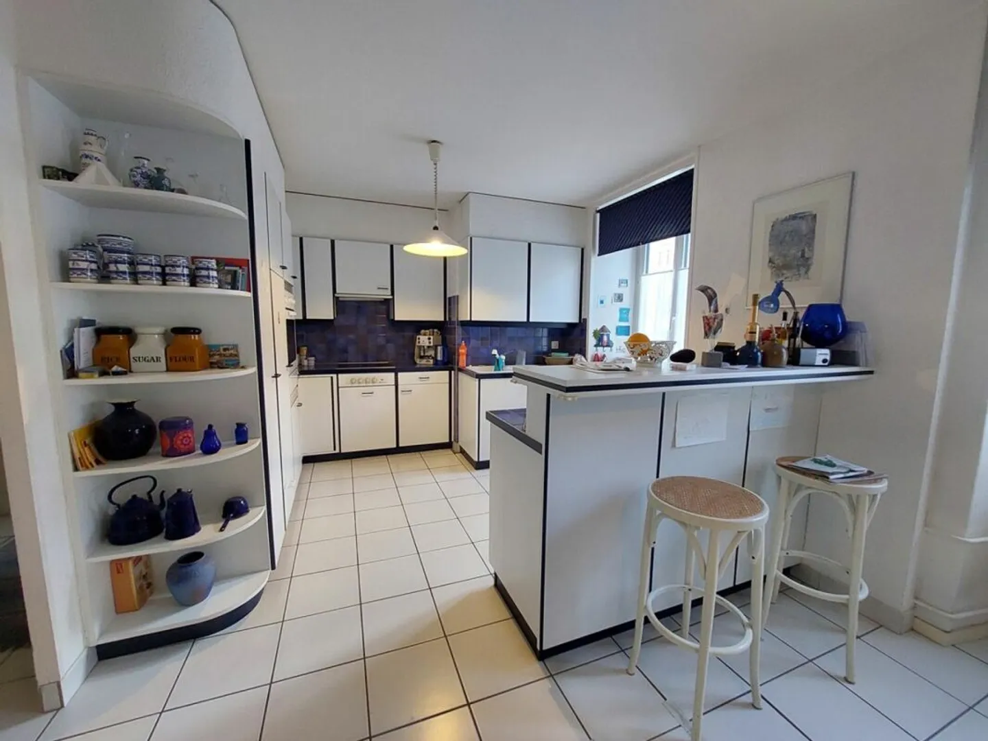 Immeuble de rendement situé dans rue piétonne - 5 appartements et 2 commerces - Photo 7 sur 17