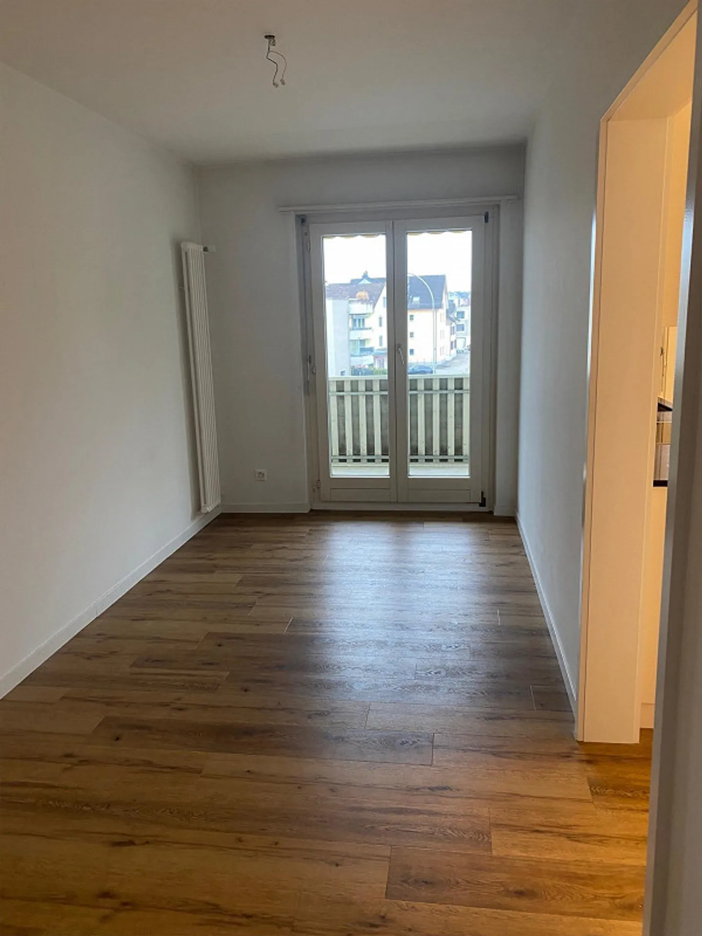 Geräumige Wohnung mit Balkon - Foto 5 von 8