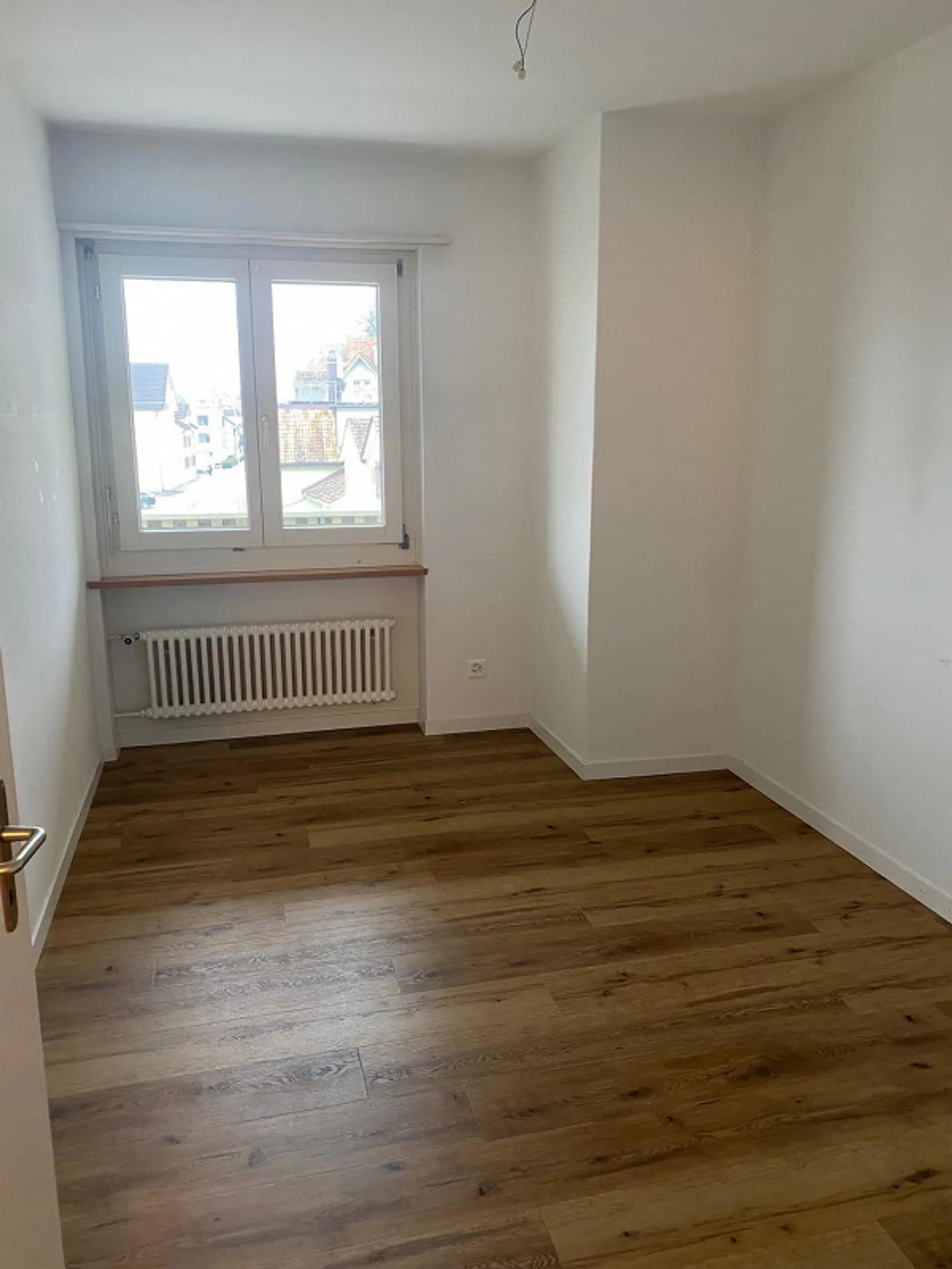 Geräumige Wohnung mit Balkon - Foto 8 von 8