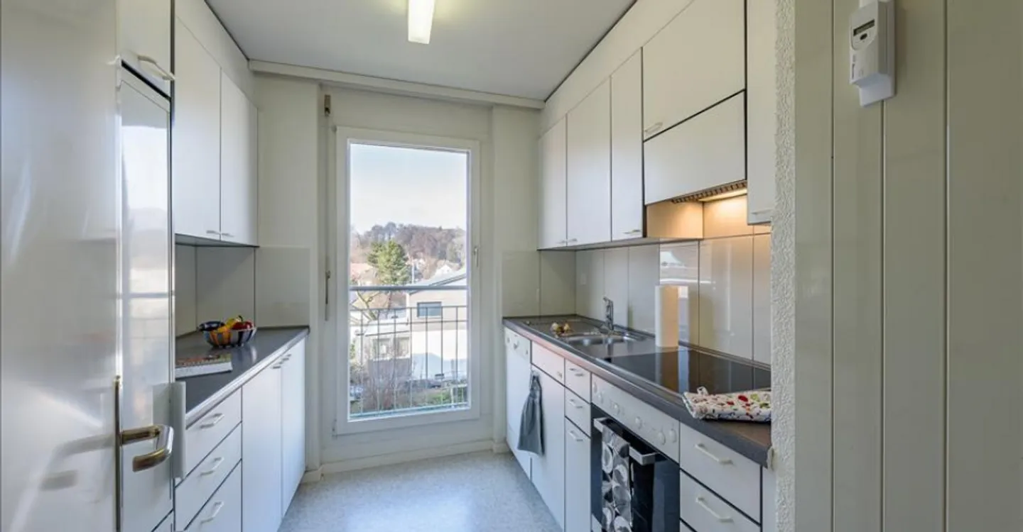 Geräumige Dachwohnung im Zentrum - Foto 3 von 9