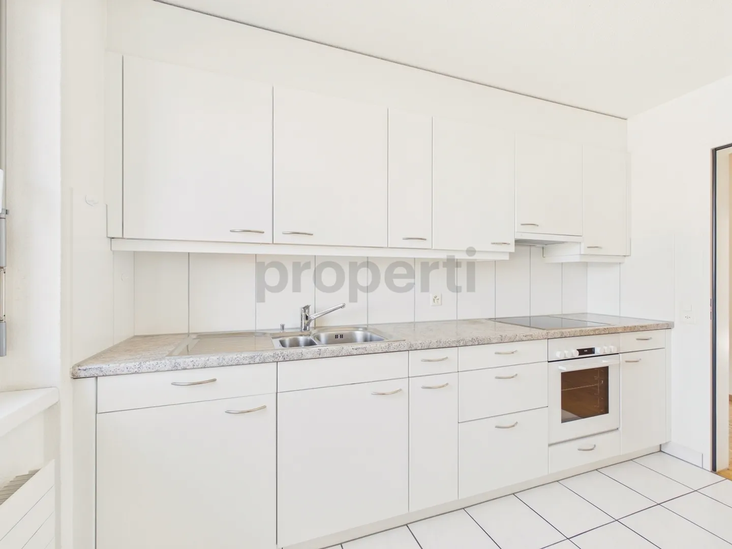 Appartement lumineux de 3,5 pièces avec balcon à Uzwil - Photo 2 sur 11