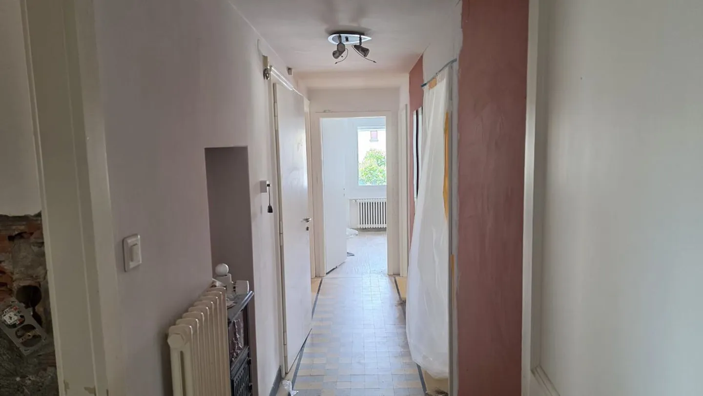 Bâtiment avec 2 appartements, un espace commercial - 2 chambres - 2 places de parking et un garage/terrasse au centre du village - Photo 13 sur 13
