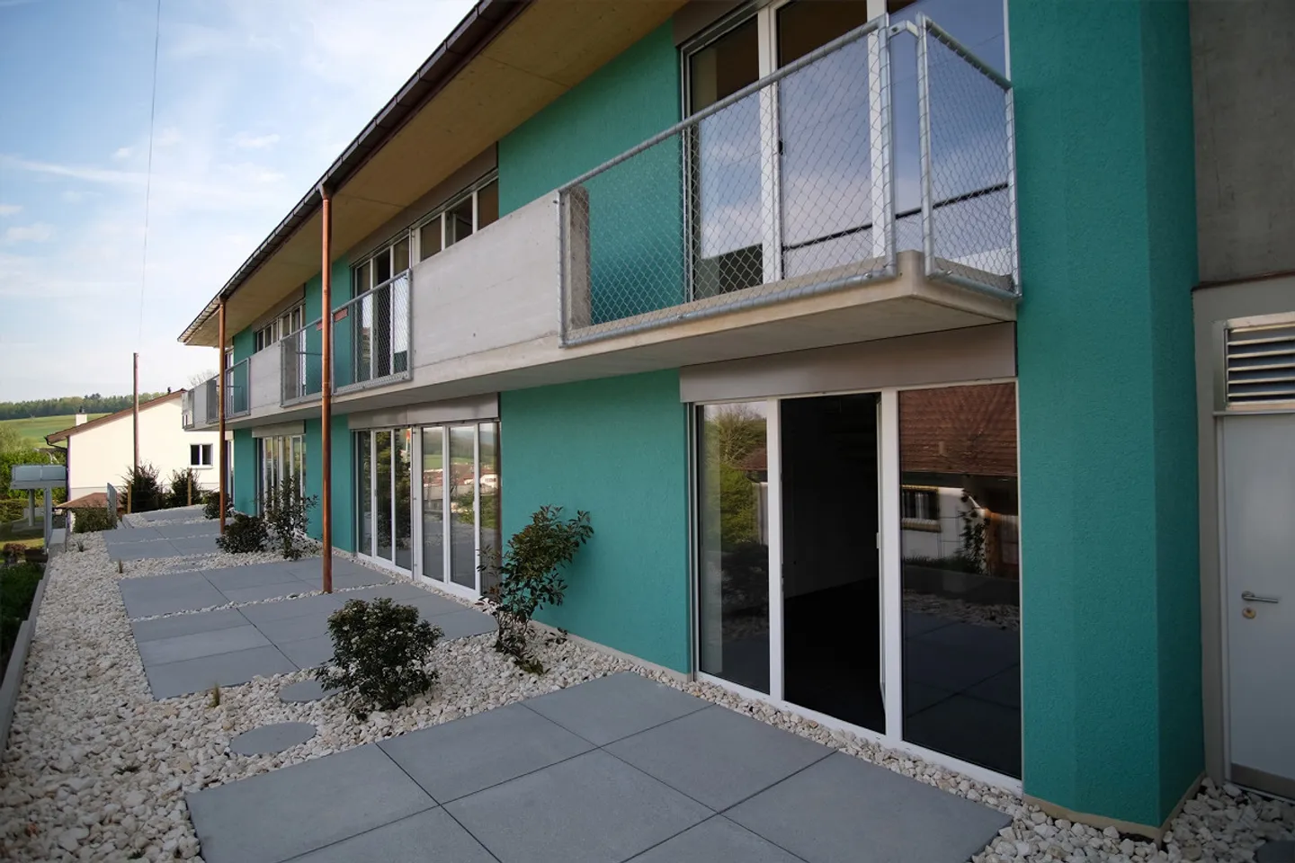 Appartement en rangée de 3 pièces à Arisdorf dans un emplacement ensoleillé et calme - Photo 1 sur 9