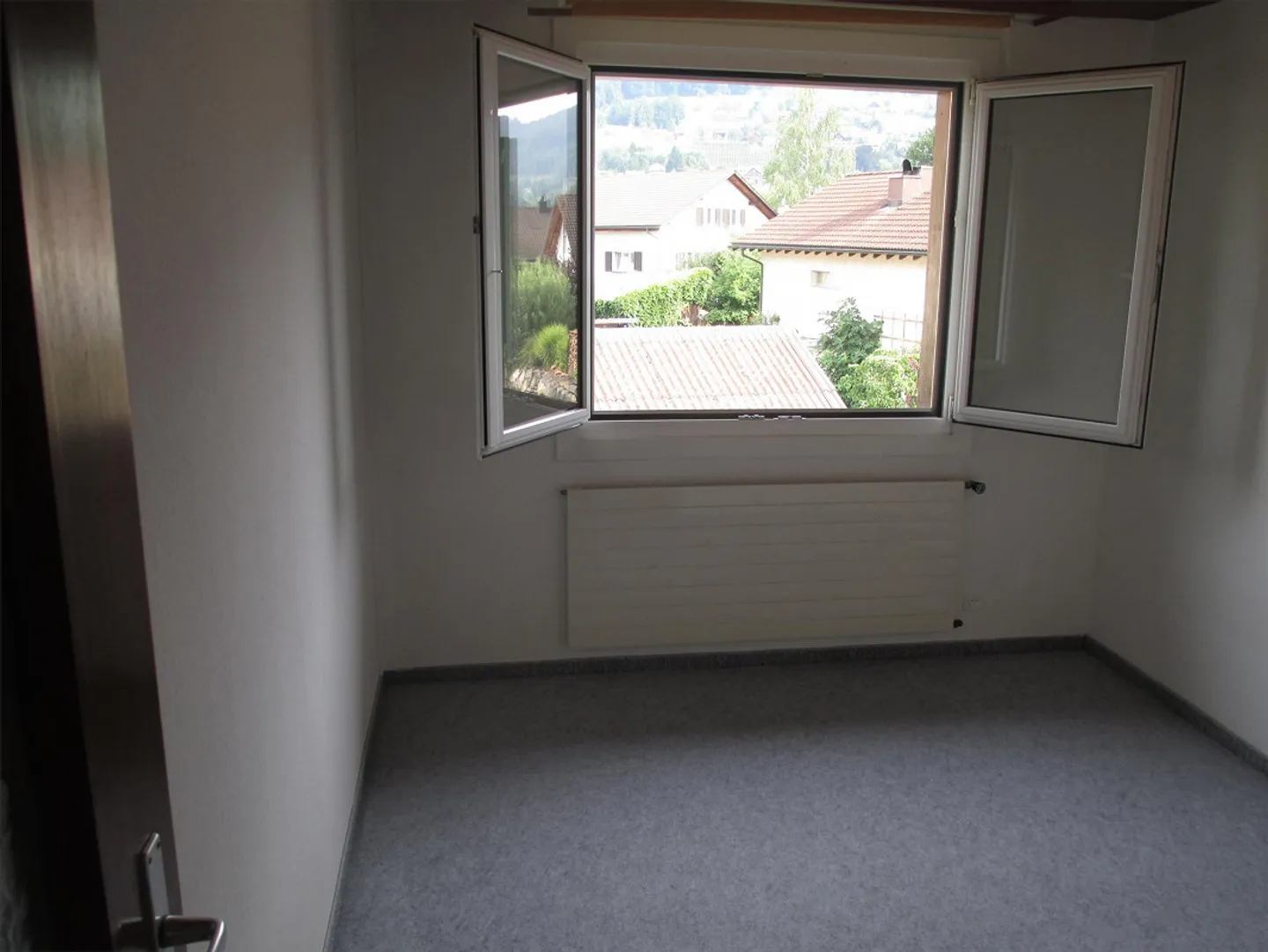 Maison multifamiliale avec 3 appartements; située au calme, mais centrale - Photo 11 sur 16