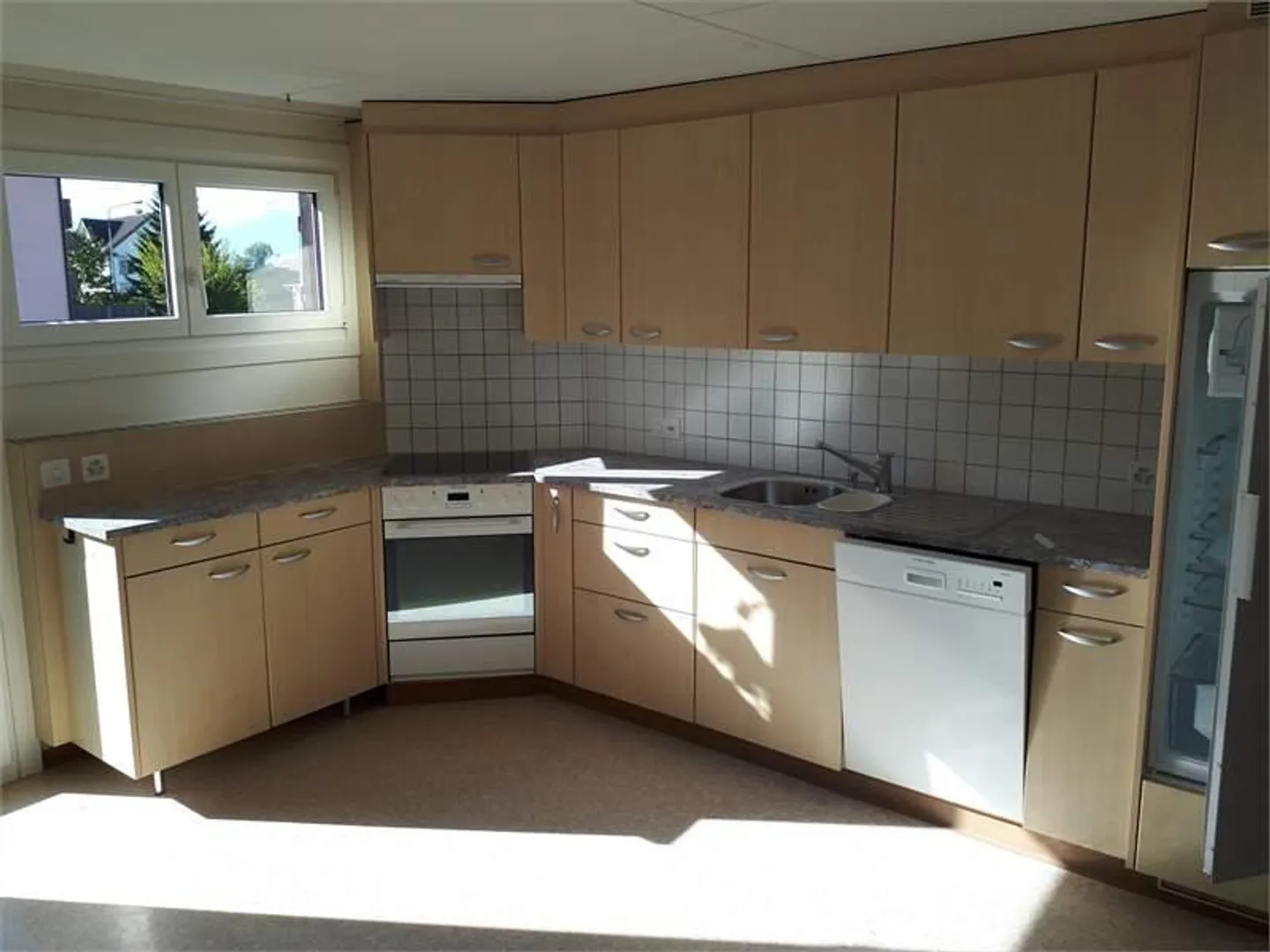 Maison multifamiliale avec 3 appartements; située au calme, mais centrale - Photo 13 sur 16