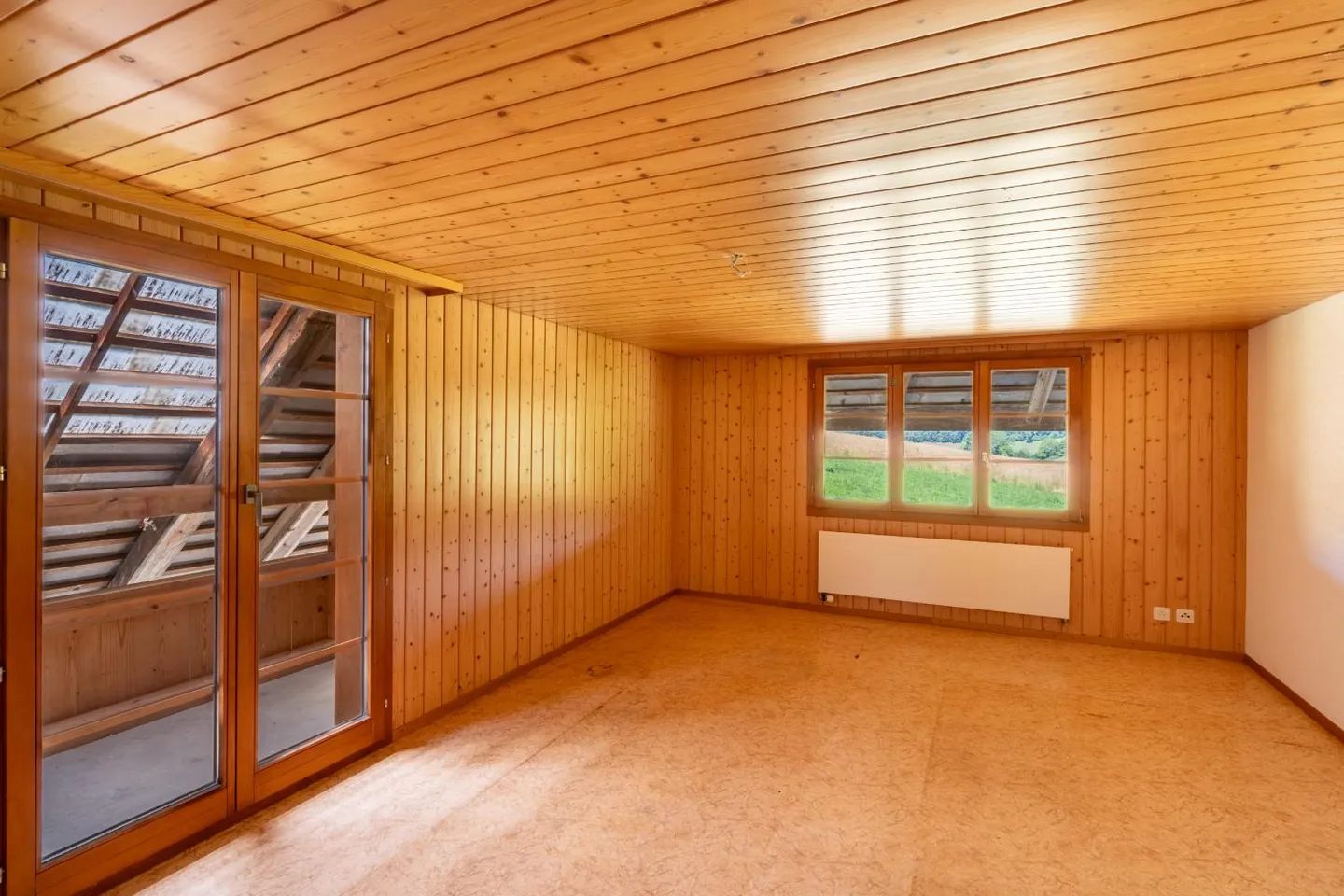 Two-family house with plenty of outdoor space by the idyllic stream in Sumiswald - Photo 6 of 9