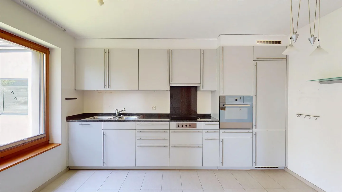 Beautiful 4.5-room maisonette apartment with covered balcony in a quiet location - Photo 7 of 12