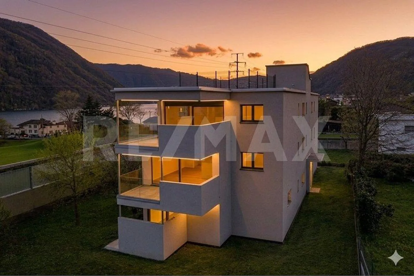 Duplex 3 ½ Zimmer mit Seeblick und Garten - wie ein Haus in Melano - Foto 1 von 13