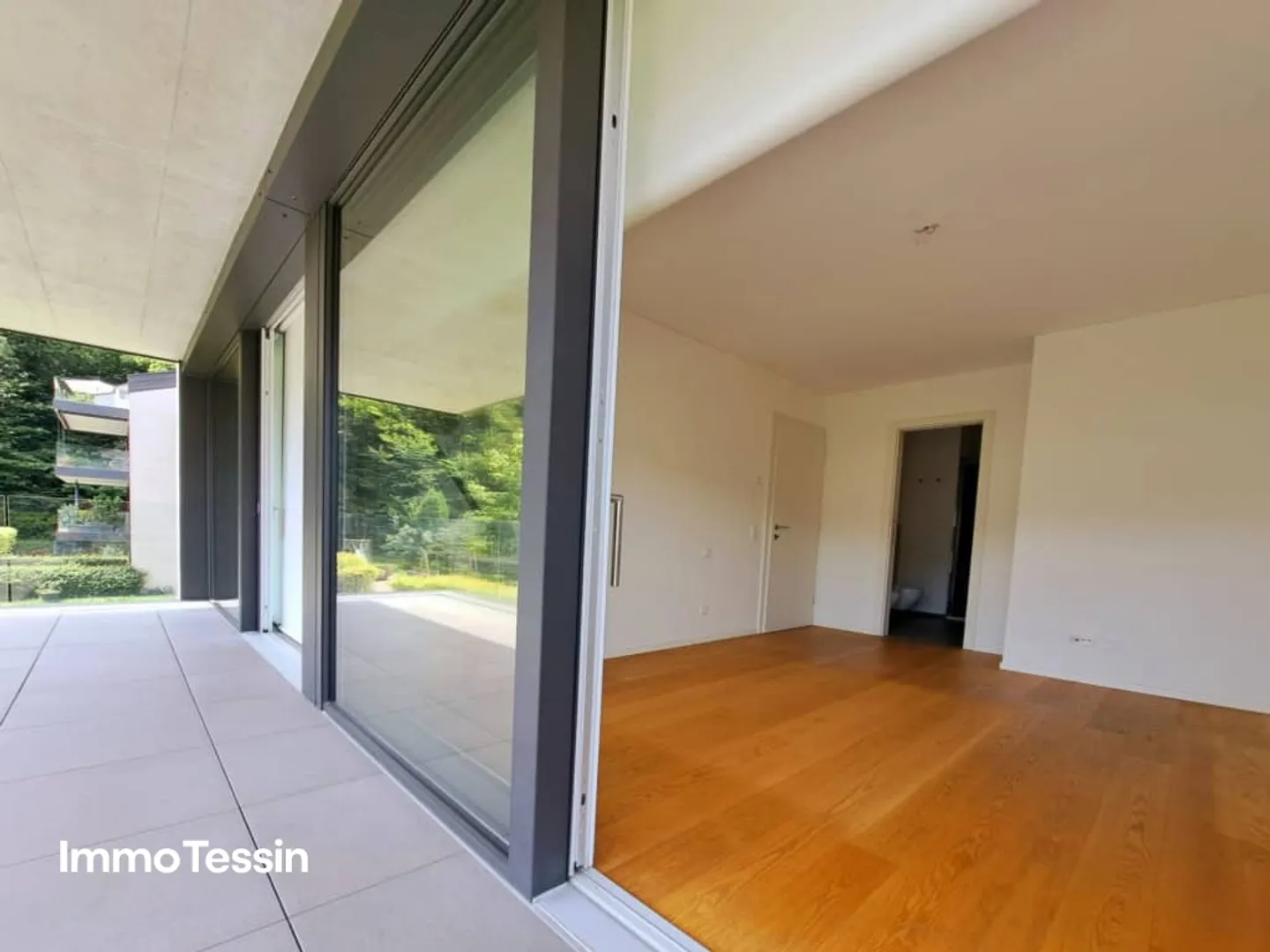 Exklusive & neuwertige Wohnung nahe Lugano und dem Lago die Lugano mit freier Sicht in die Tessiner Bergwelt - Foto 7 von 13