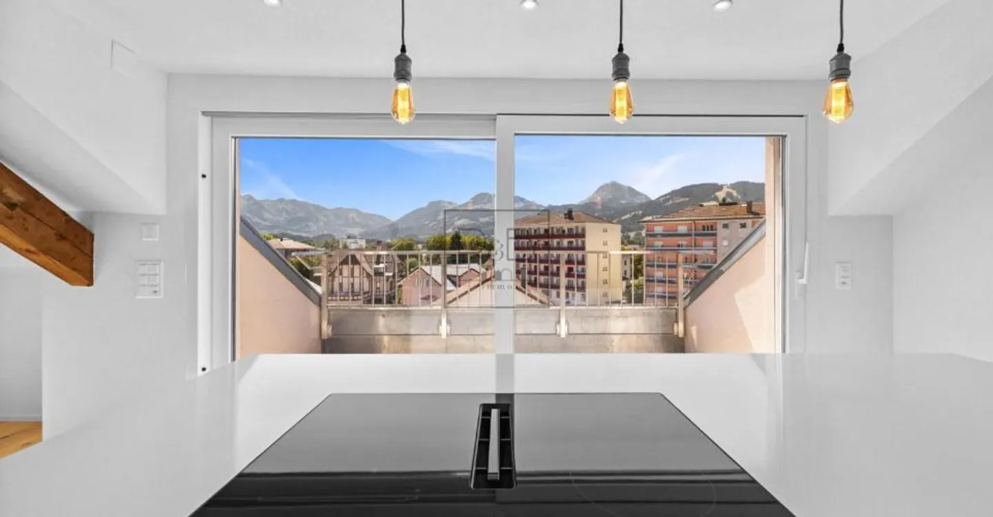 Loft rénové sous combles à Bulle - Photo 4 sur 9
