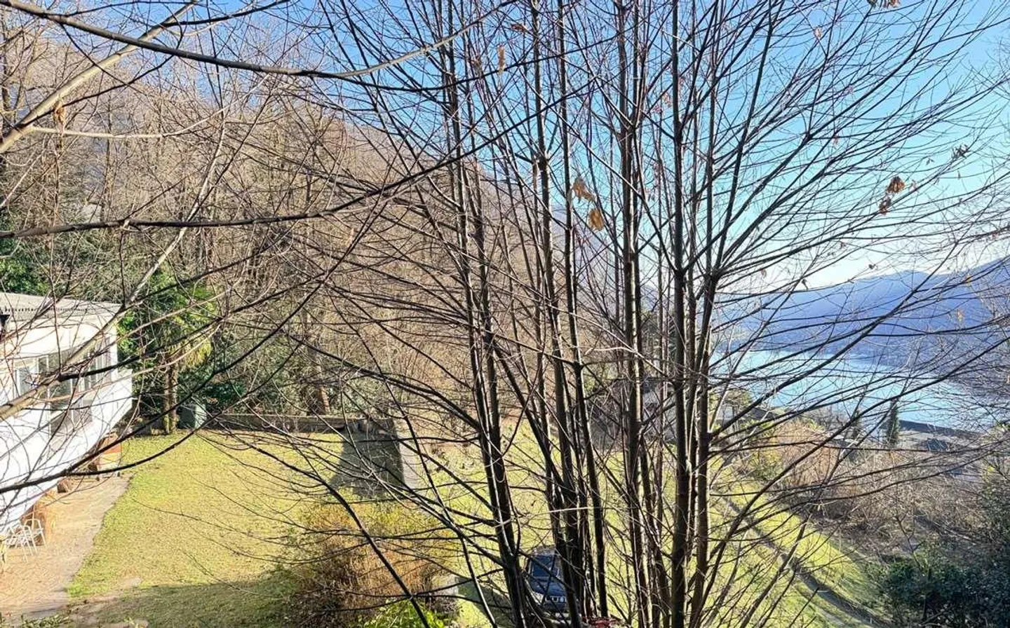 ROVIO: SCHÖNES HAUS MIT SEEBLICK UND GROSSEM GRUNDSTÜCK - Foto 4 von 8