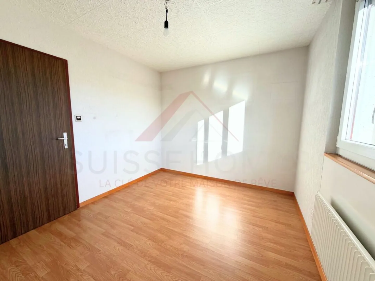Appartement lumineux avec balcon - Photo 3 sur 12