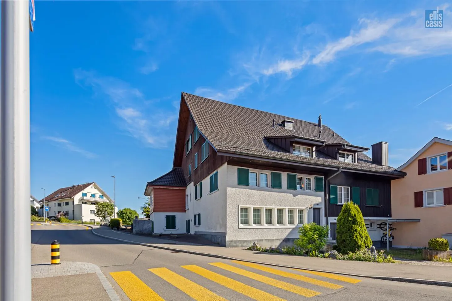 Well-maintained multi-family house with underground garage in the village center! - Photo 1 of 36