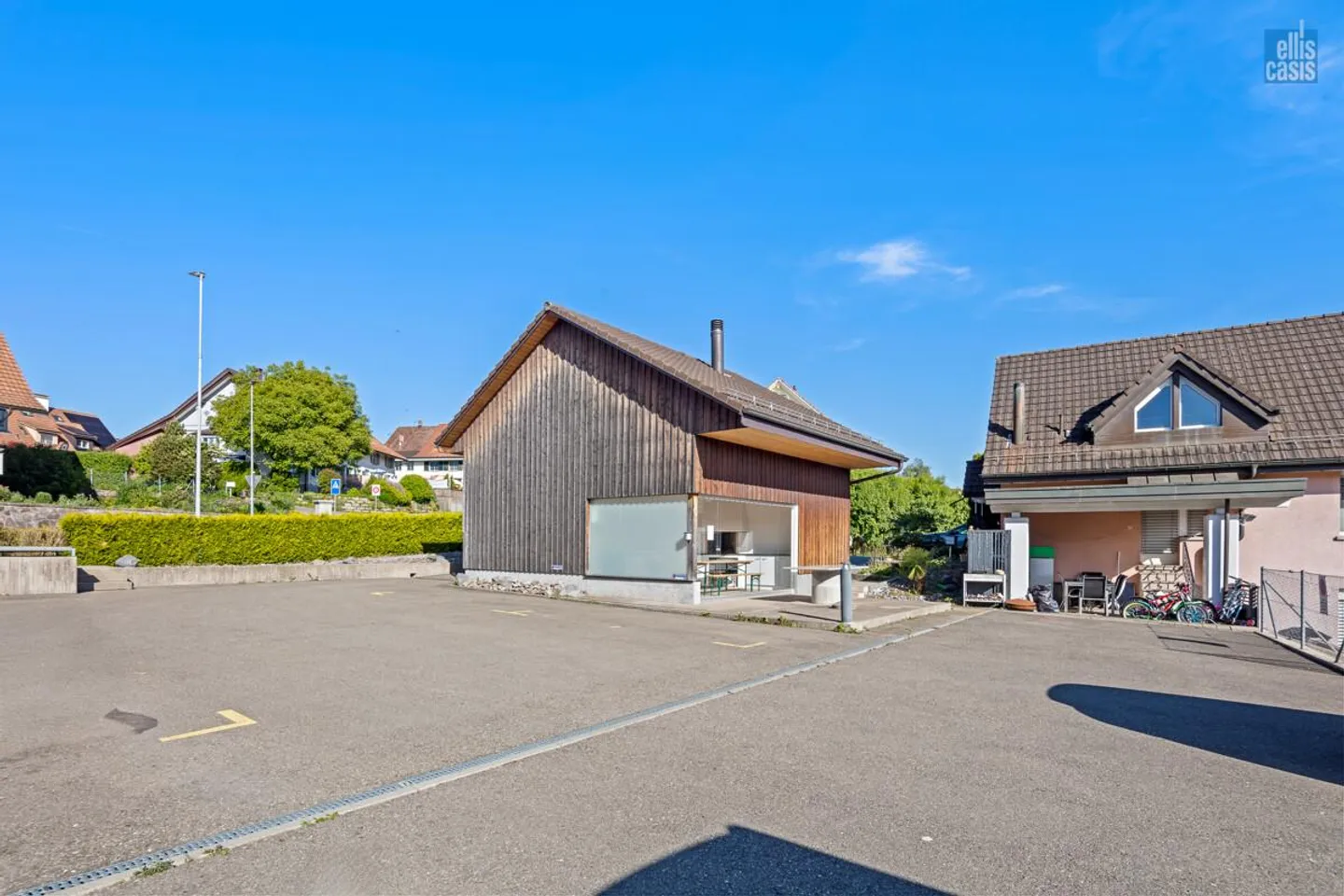 Well-maintained multi-family house with underground garage in the village center! - Photo 3 of 36