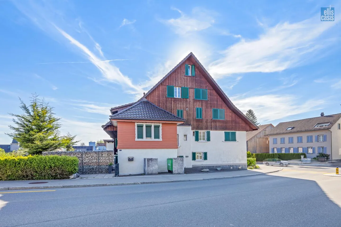 Well-maintained multi-family house with underground garage in the village center! - Photo 4 of 36