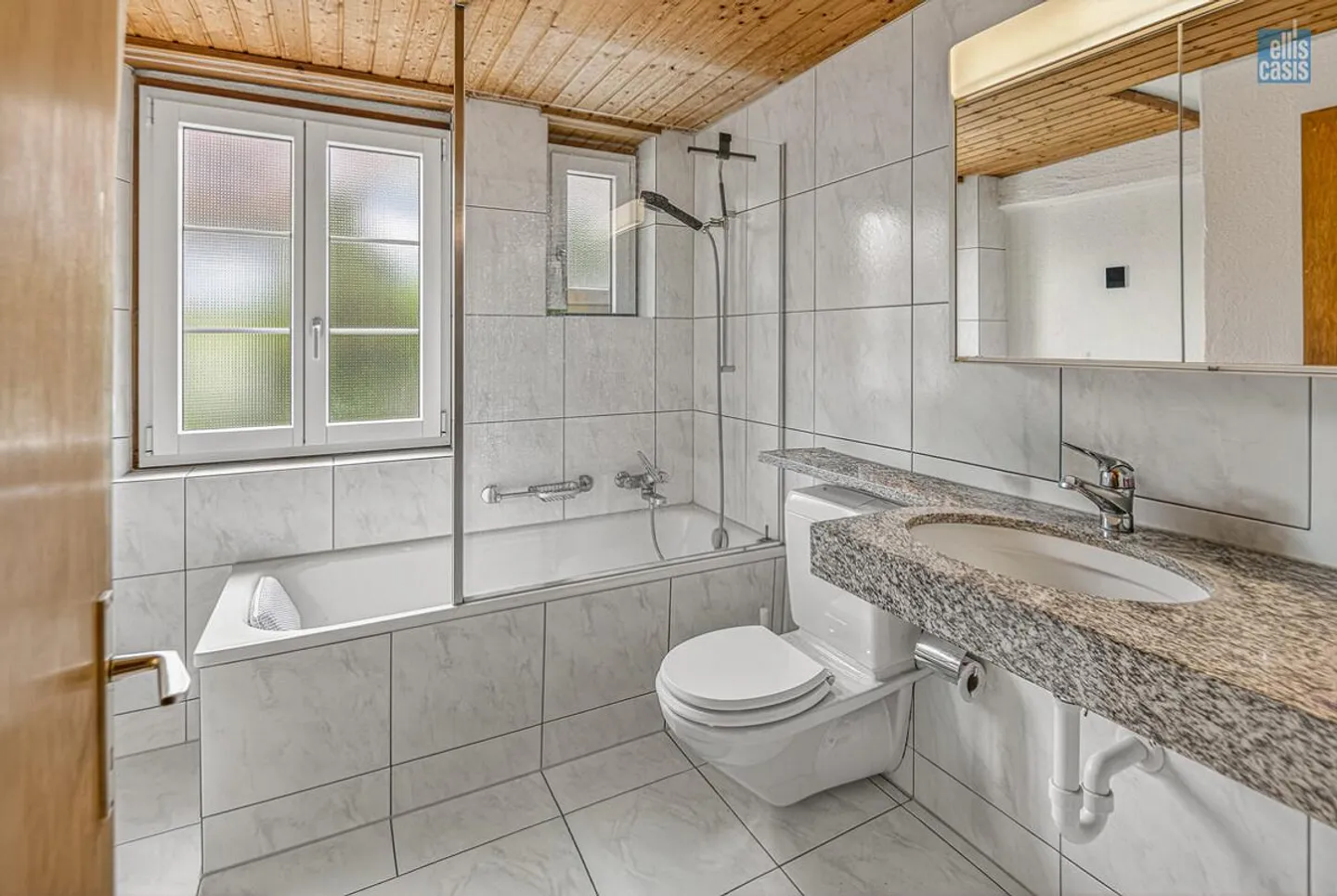 Well-maintained multi-family house with underground garage in the village center! - Photo 8 of 36