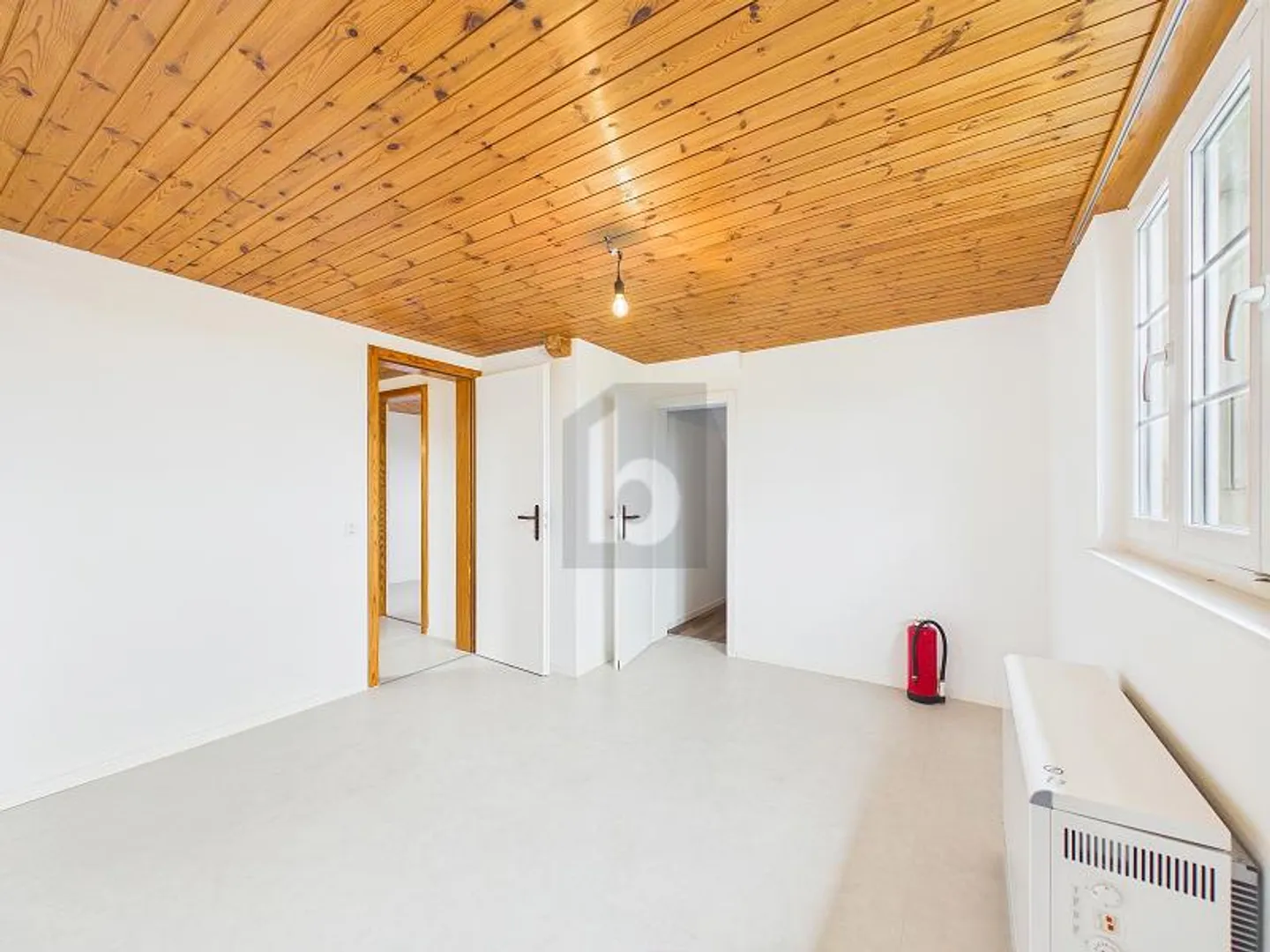 LIGHT-FILLED AND COZY - Photo 2 of 6