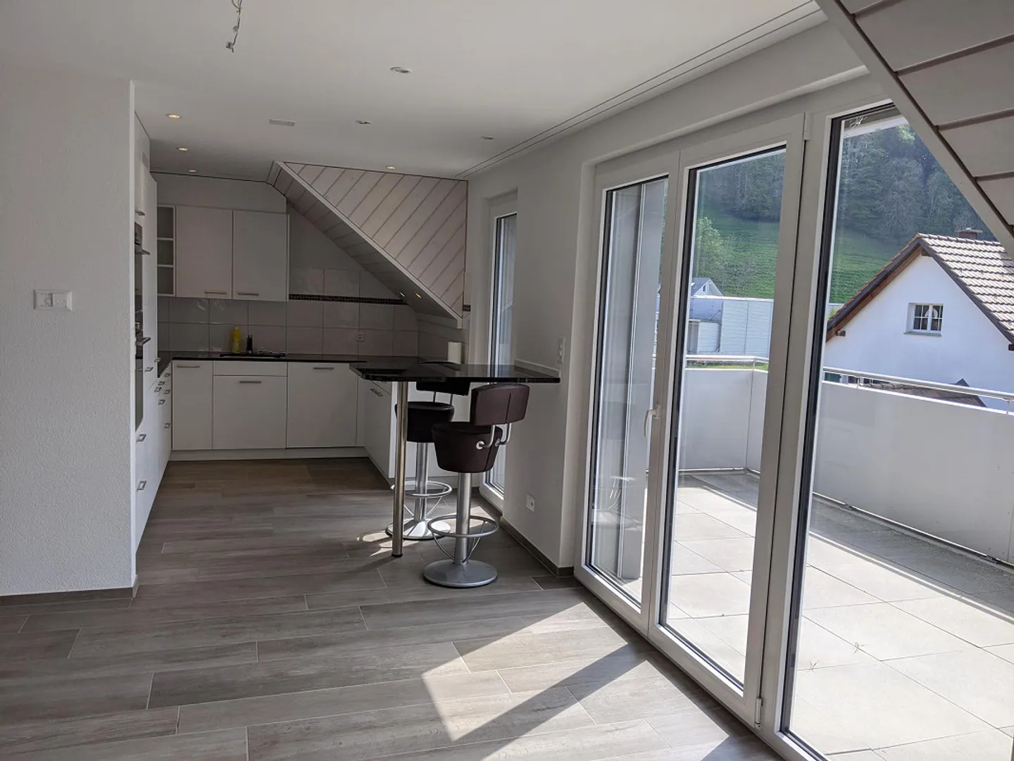 5.5 Room Attic Apartment with Large Balcony and View into the Green - Photo 4 of 25