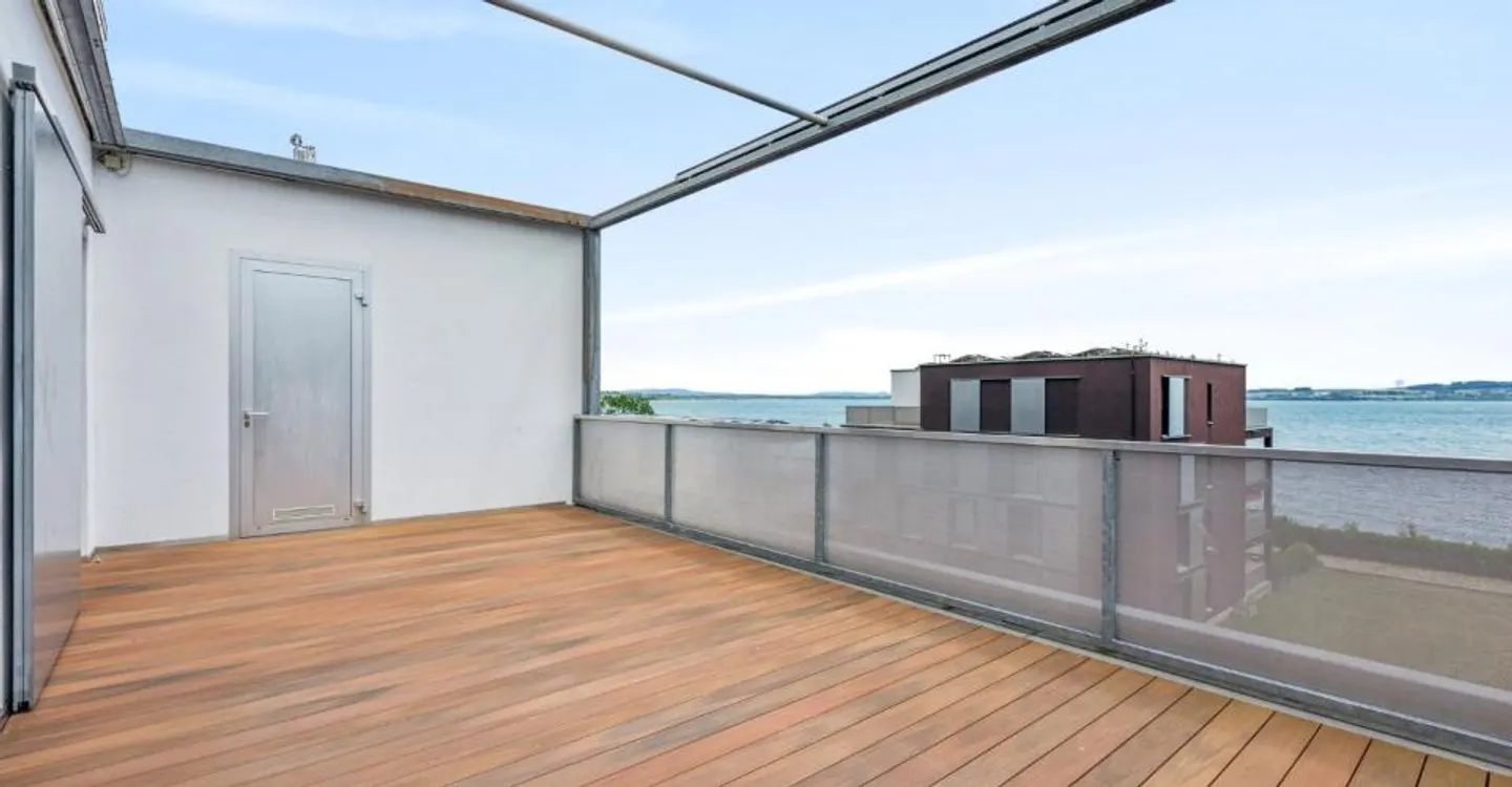 Magnifico attico di 3,5 locali, fronte lago con spiaggia privata - Foto 6 di 8