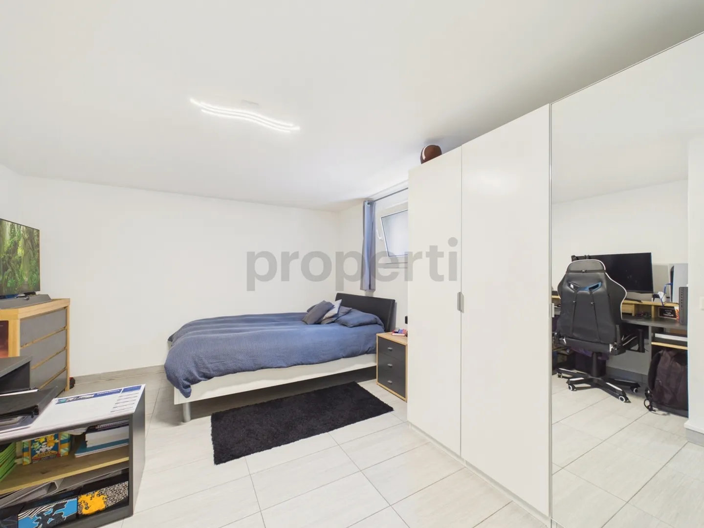Einfamilienhaus mit 6,5 Zimmern, exklusivem Garten und großzügigen Räumen... - Foto 8 von 13
