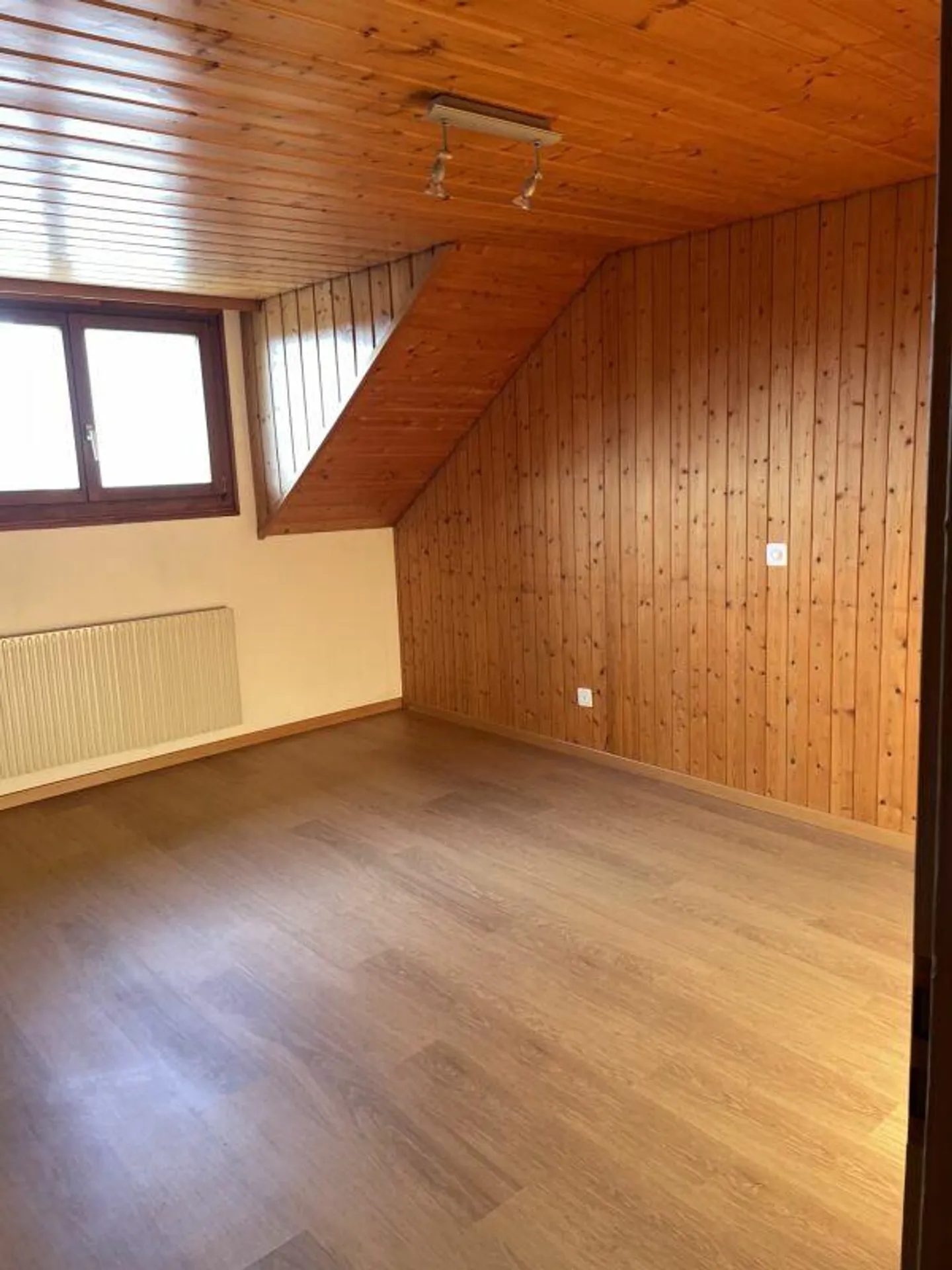 Charmante Dachwohnung - Foto 4 von 12