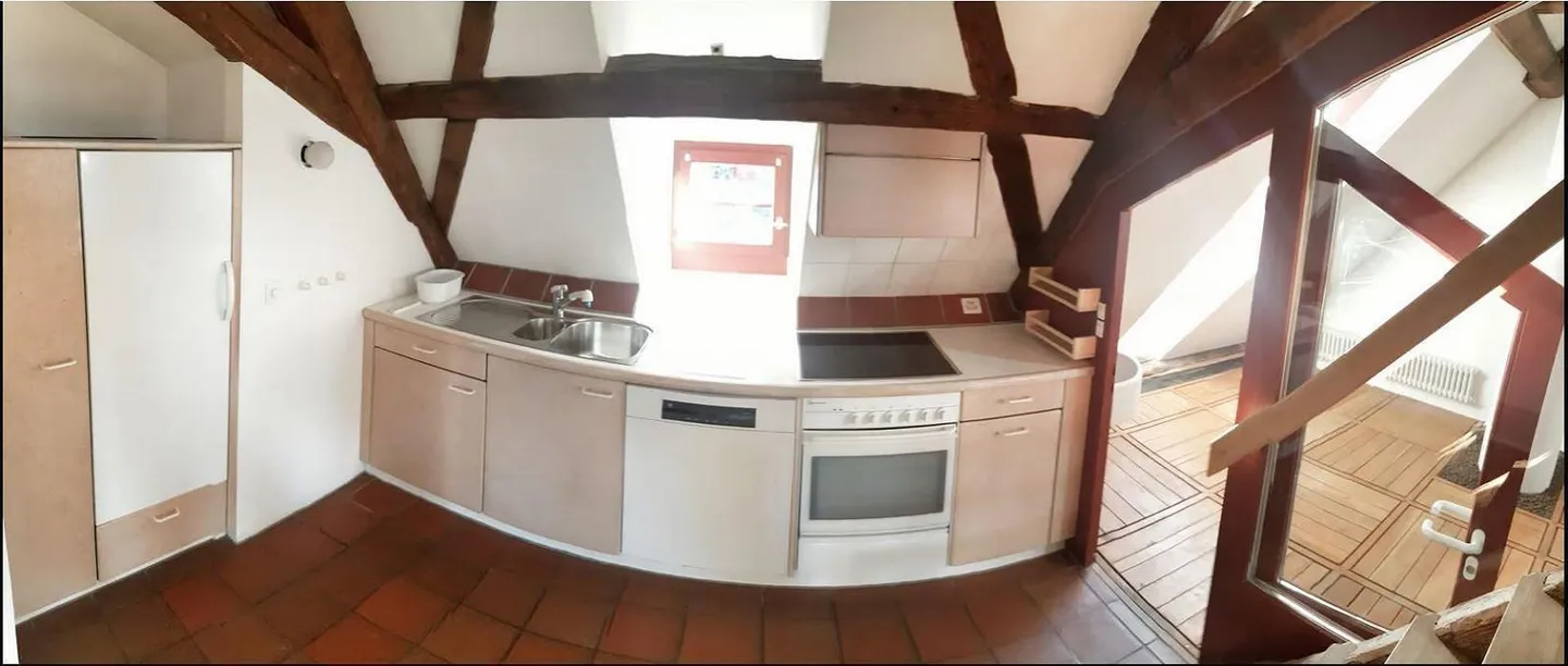 Dachwohnung aus dem 15. Jahrhundert - Foto 10 von 11