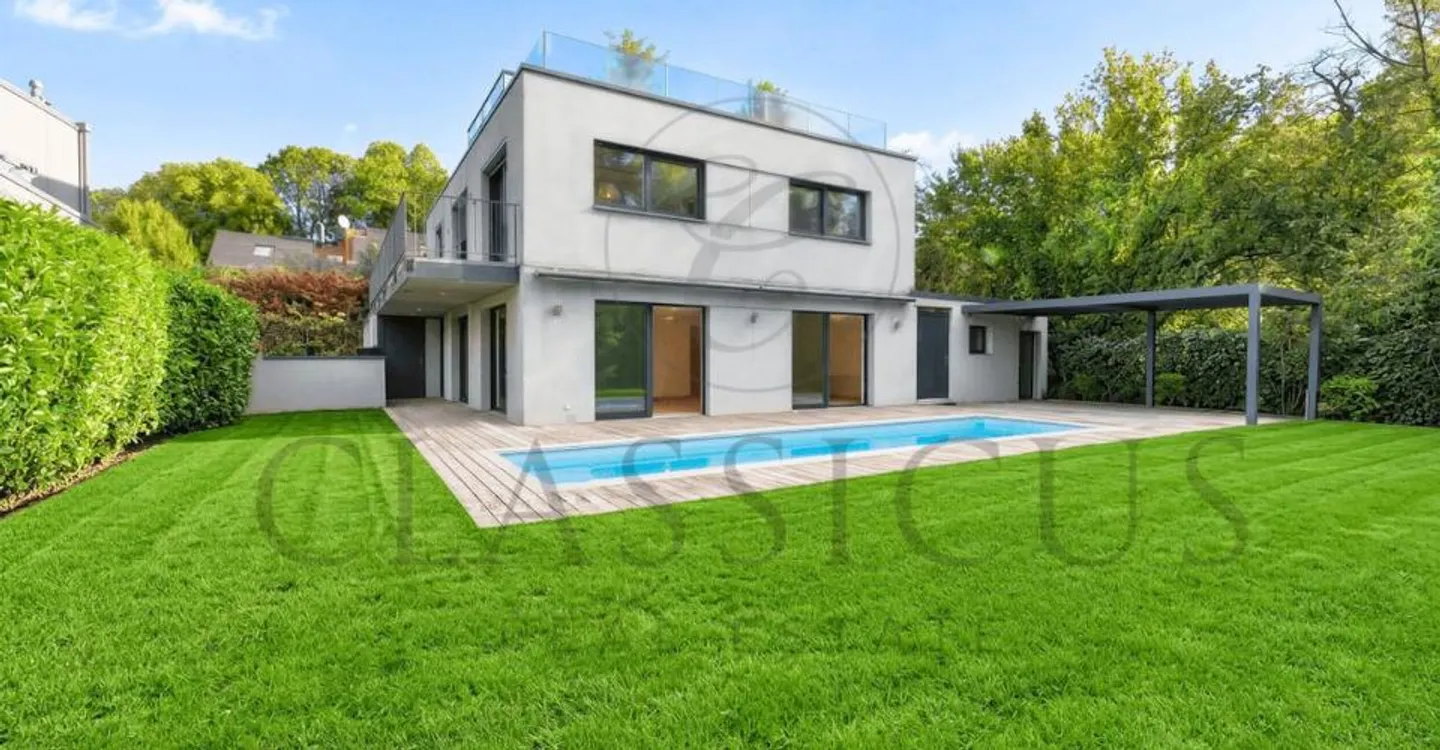 Contemporary House with Pool - Photo 1 of 12