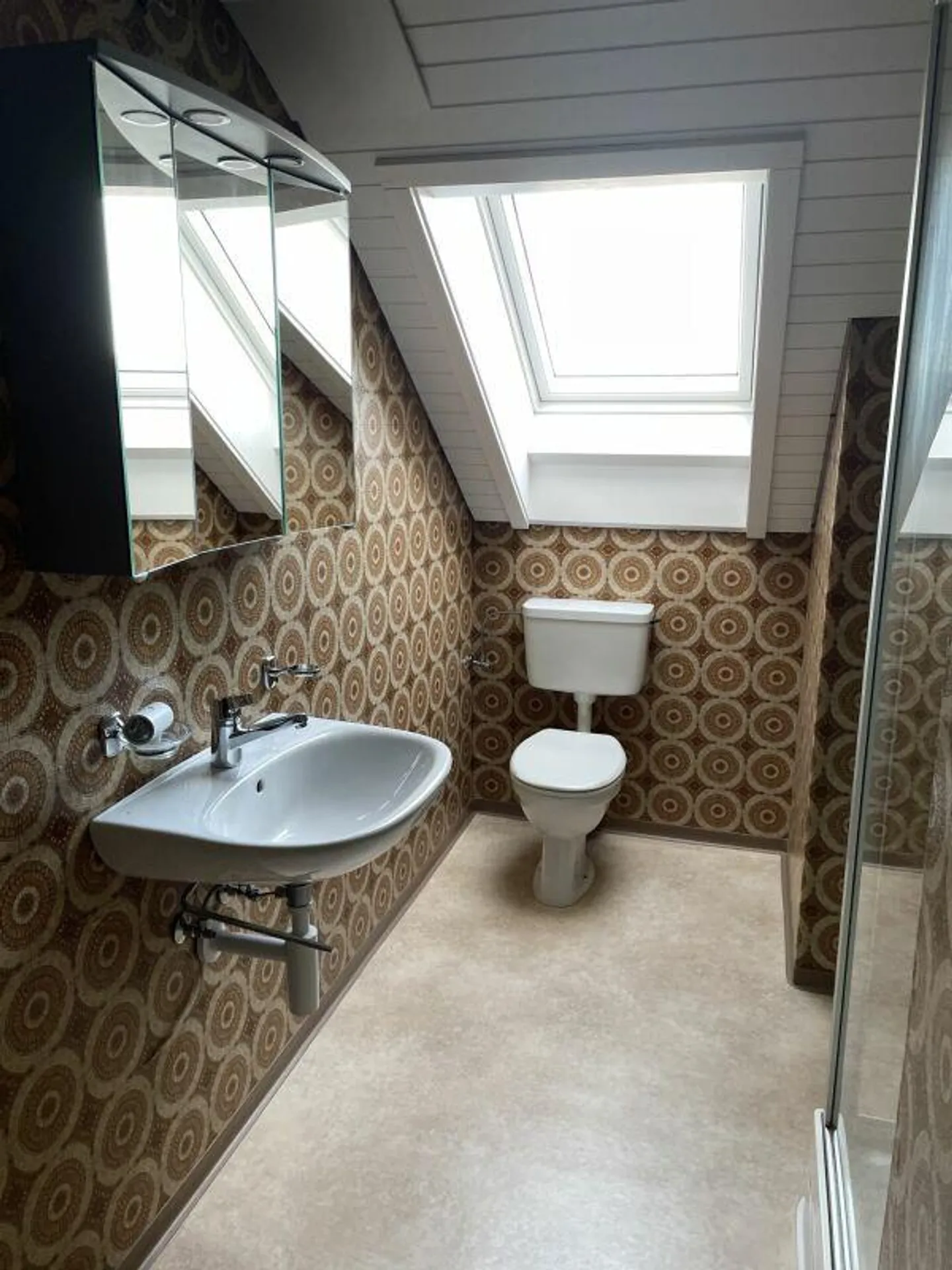 Charmante Dachwohnung - Foto 11 von 12