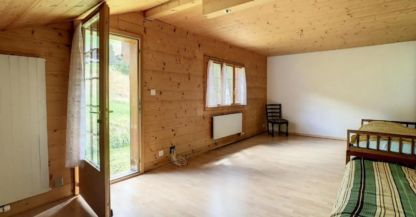 Chalet mit zwei Wohnungen und einem Geschäft | BC IMMO - Foto 9 von 11