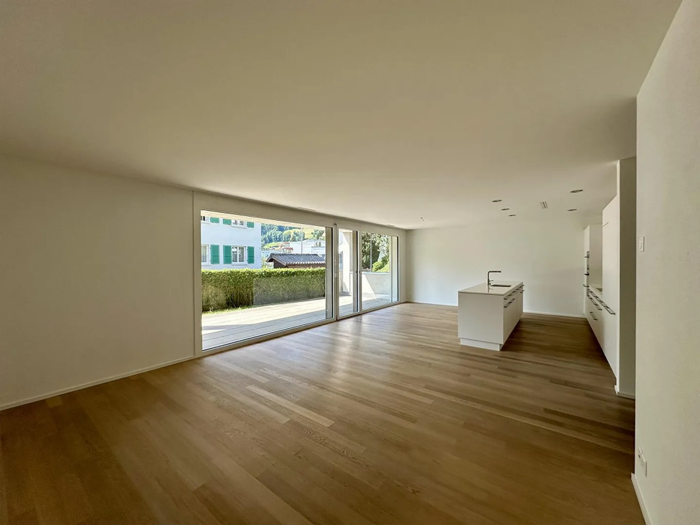 Appartement 4.5 pièces avec terrasse généreuse - Photo 2 sur 11