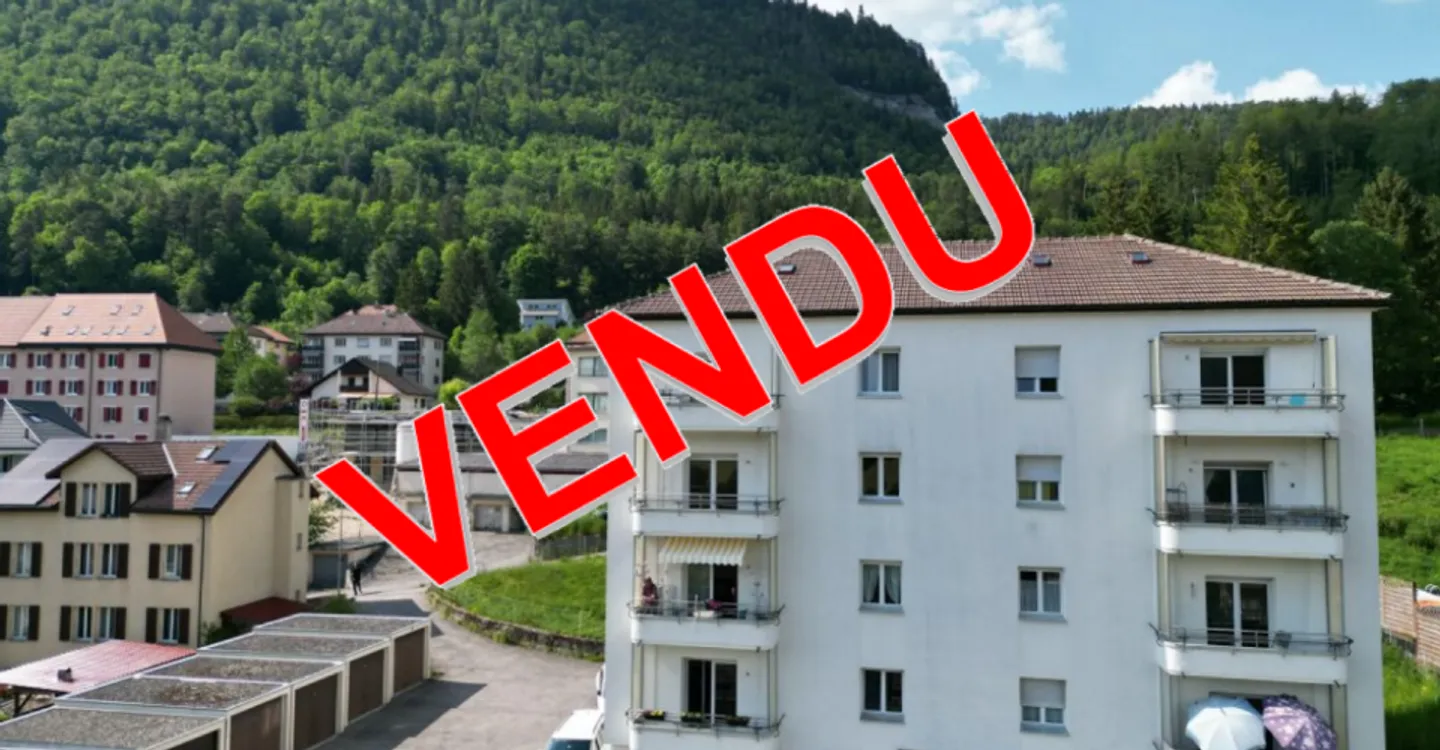 St-Imier, Gebäude 8 Wohnungen, 6 Garagen - 5,7% Rendite - vollständig vermietet - Foto 1 von 5