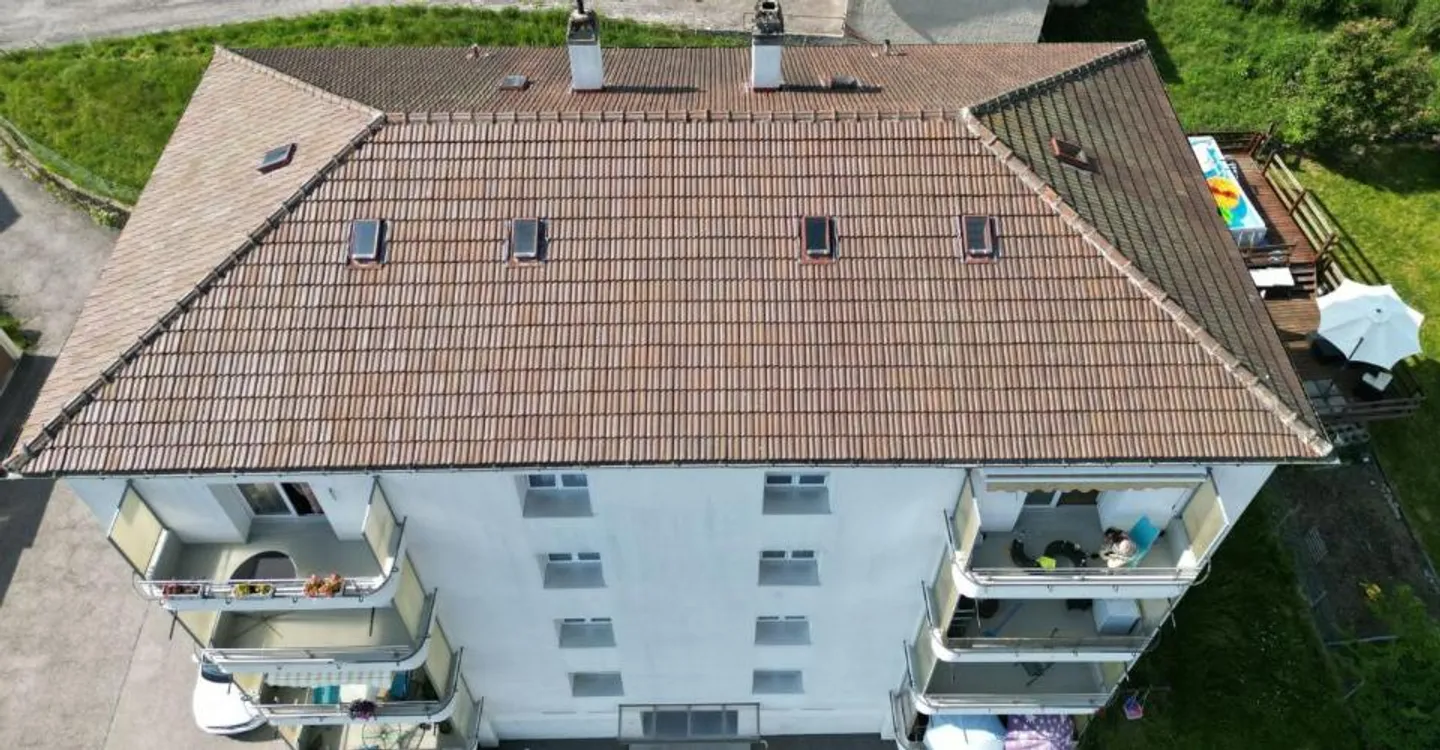 St-Imier, Gebäude 8 Wohnungen, 6 Garagen - 5,7% Rendite - vollständig vermietet - Foto 5 von 5