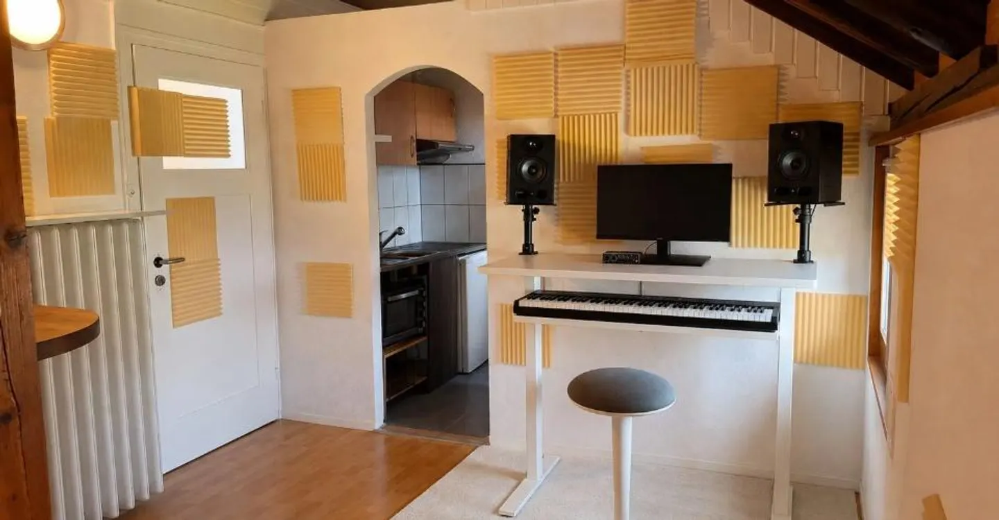 Charmante Dachgeschosswohnung mit 1 Zimmer in Echallens - Foto 3 von 7