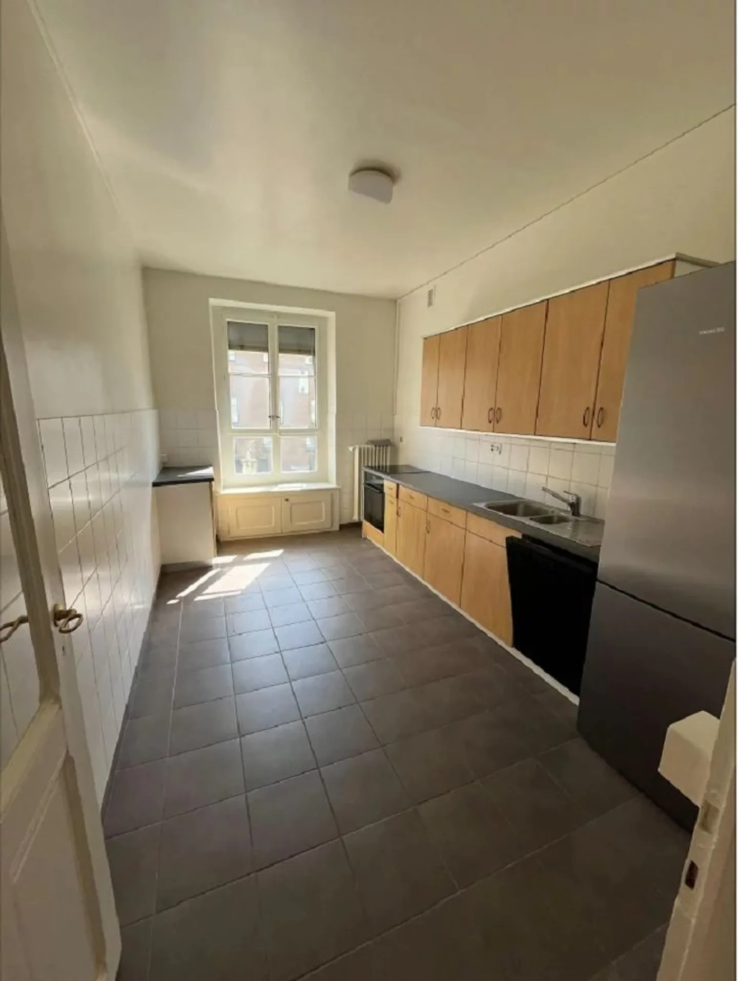 Charmant Appartement 4 Pièces - Photo 3 sur 5