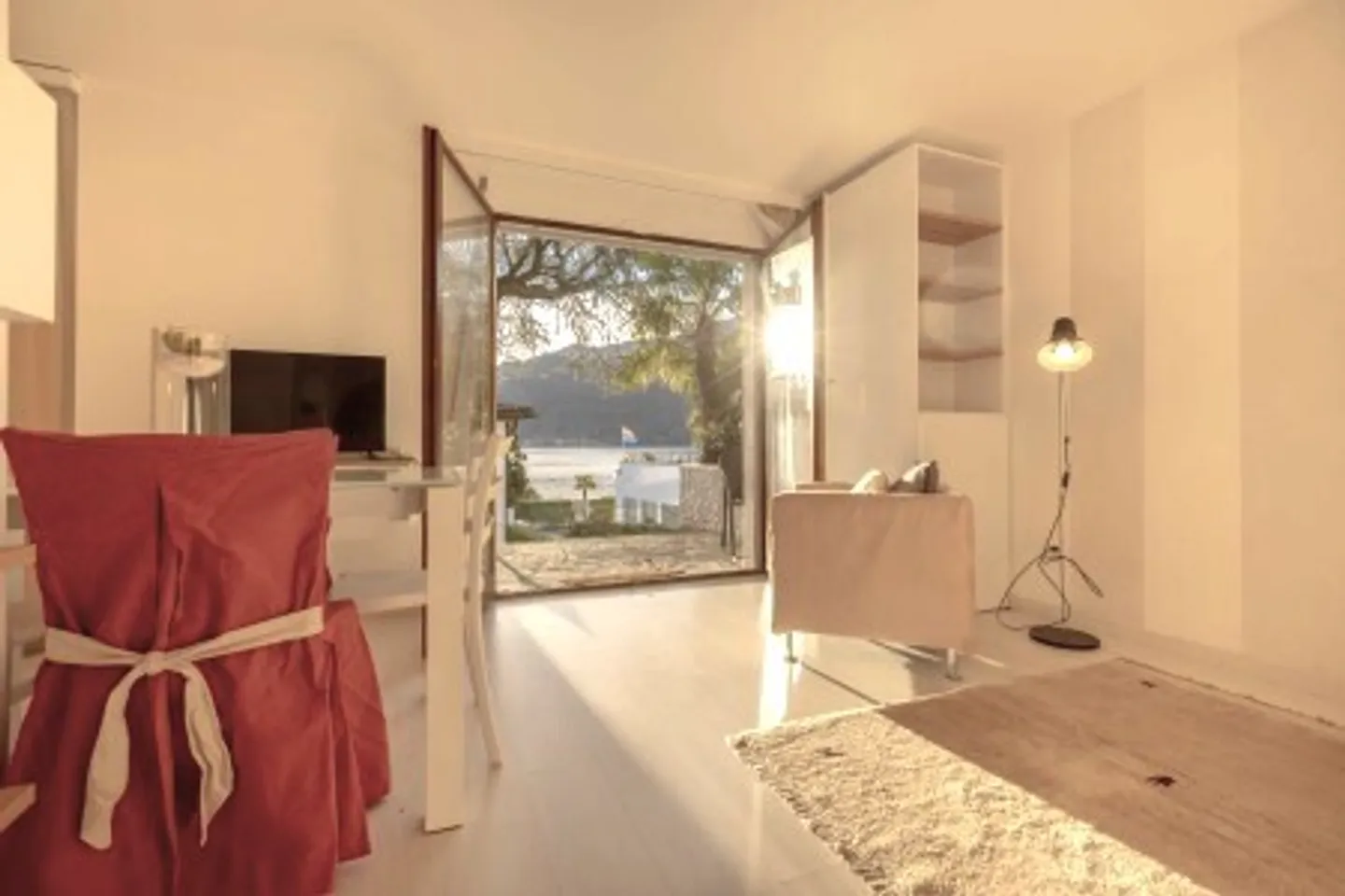 BEAUTIFUL 1.5 INCOME WITH POOL AND GARDEN IN MORCOTE - Photo 1 of 11