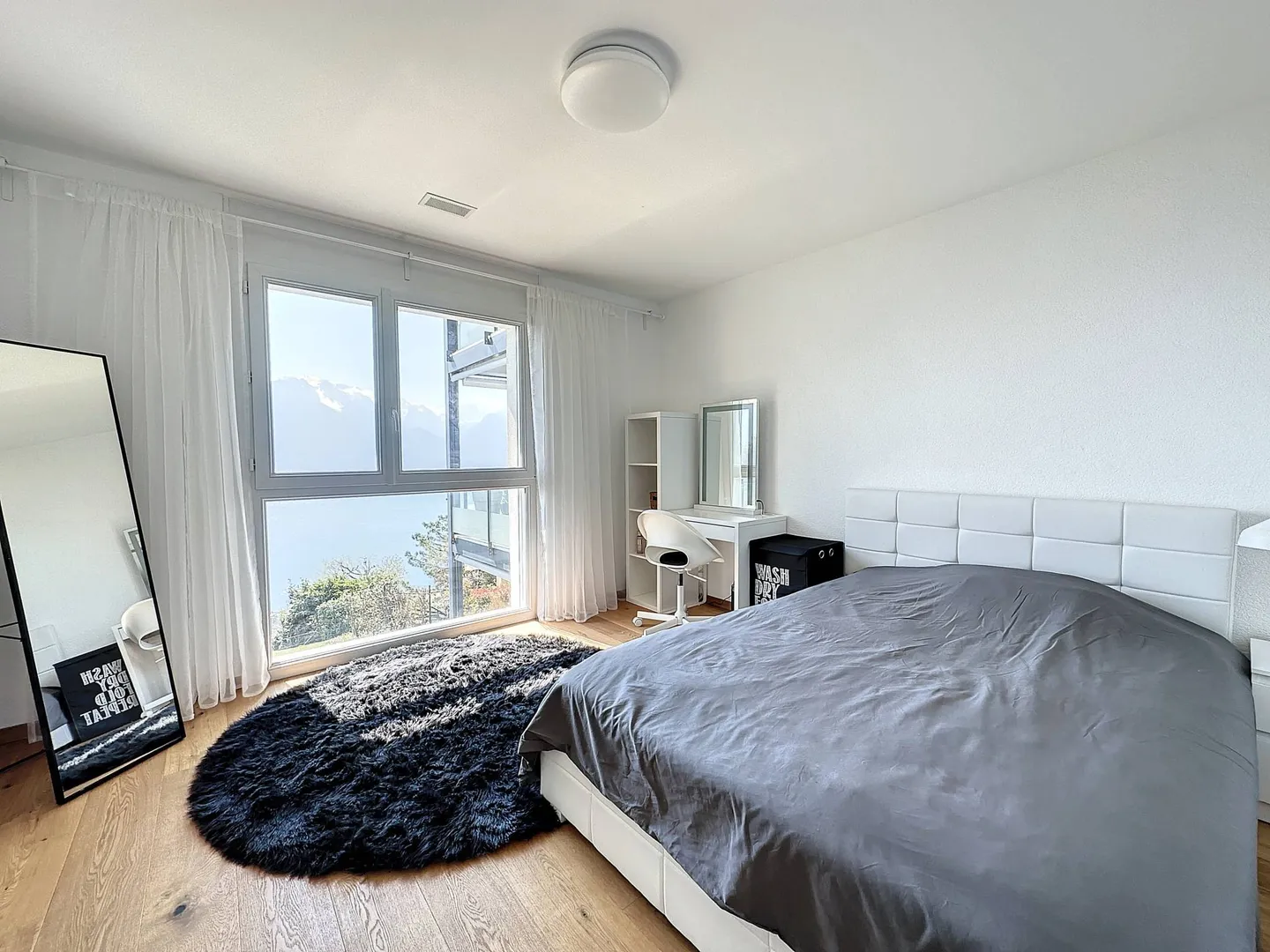 Superbo duplex di 5,5 stanze con vista panoramica sul lago di Ginevra - Foto 11 di 13