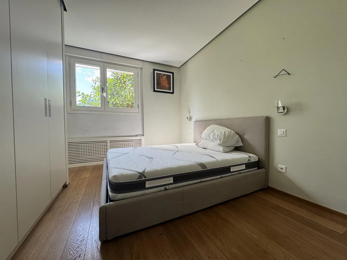 À louer appartement 2,5 pièces avec jardin, piscine et vue sur le lac à Bissone - Photo 6 sur 9