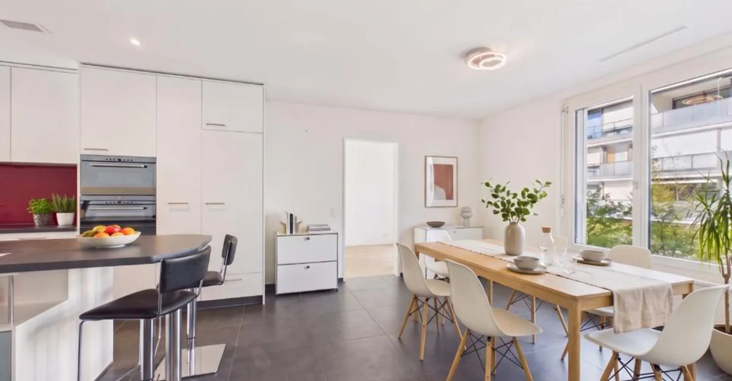 Espace de vie spacieux, cuisine design et standard Minergie ! - Photo 3 sur 12