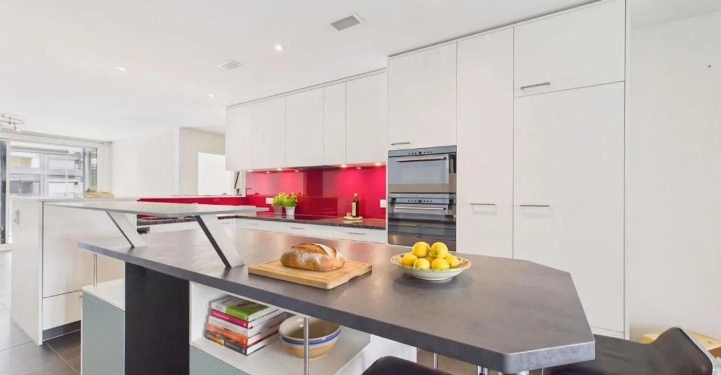 Espace de vie spacieux, cuisine design et standard Minergie ! - Photo 4 sur 12