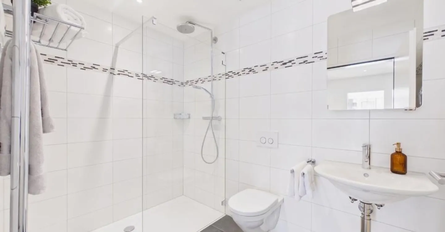 Espace de vie spacieux, cuisine design et standard Minergie ! - Photo 11 sur 12