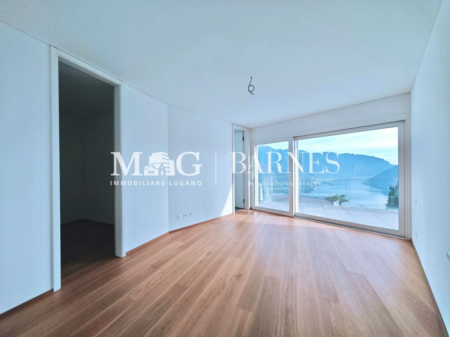 Lugano, Carona : Penthouse de 266 m², 5,5 pièces, avec vue imprenable sur le lac et grande terrasse. - Photo 11 sur 12