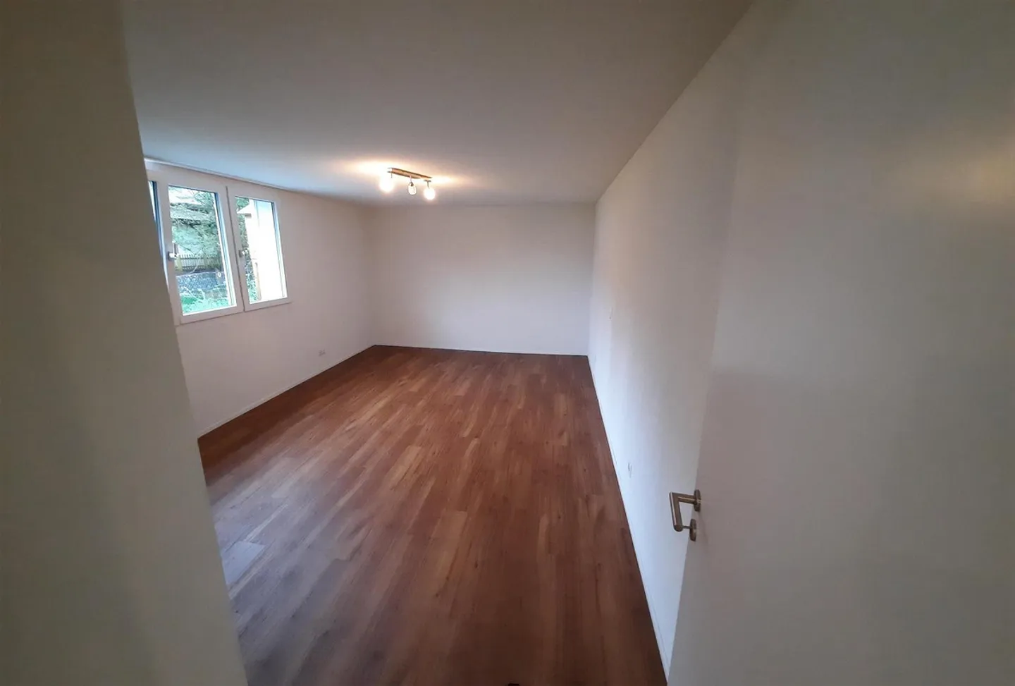 Erdgeschosswohnung mit Garten - Foto 5 von 7