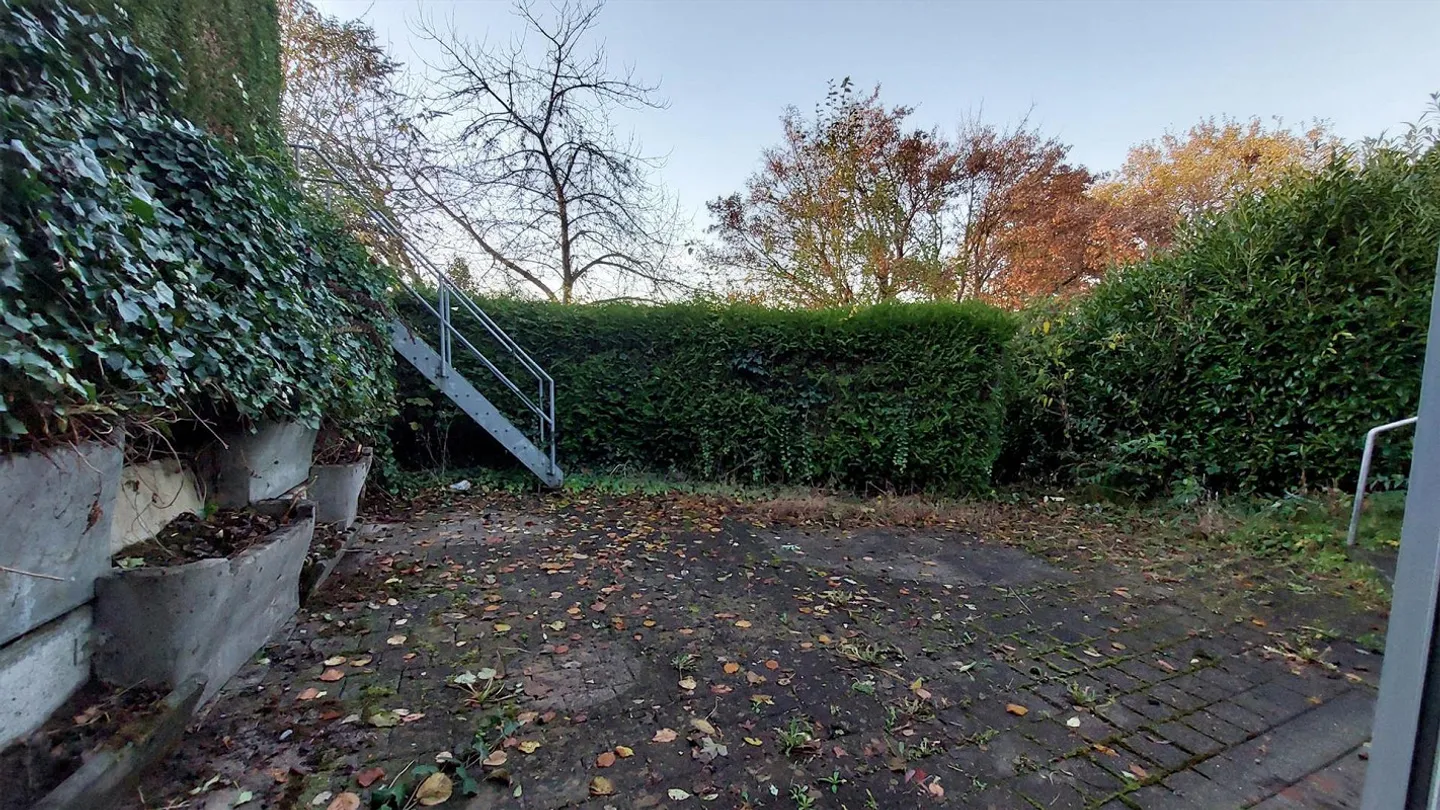 Geräumige Wohnung mit Garten - Foto 4 von 4