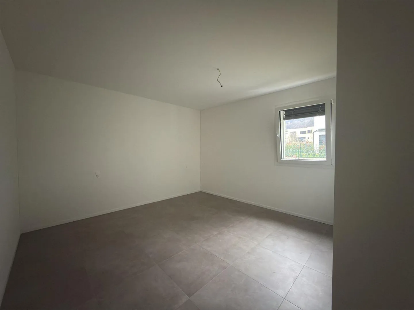 Nouveau et lumineux 2,5 pièces avec jardin à Bellinzone - Camorino - Photo 4 sur 9